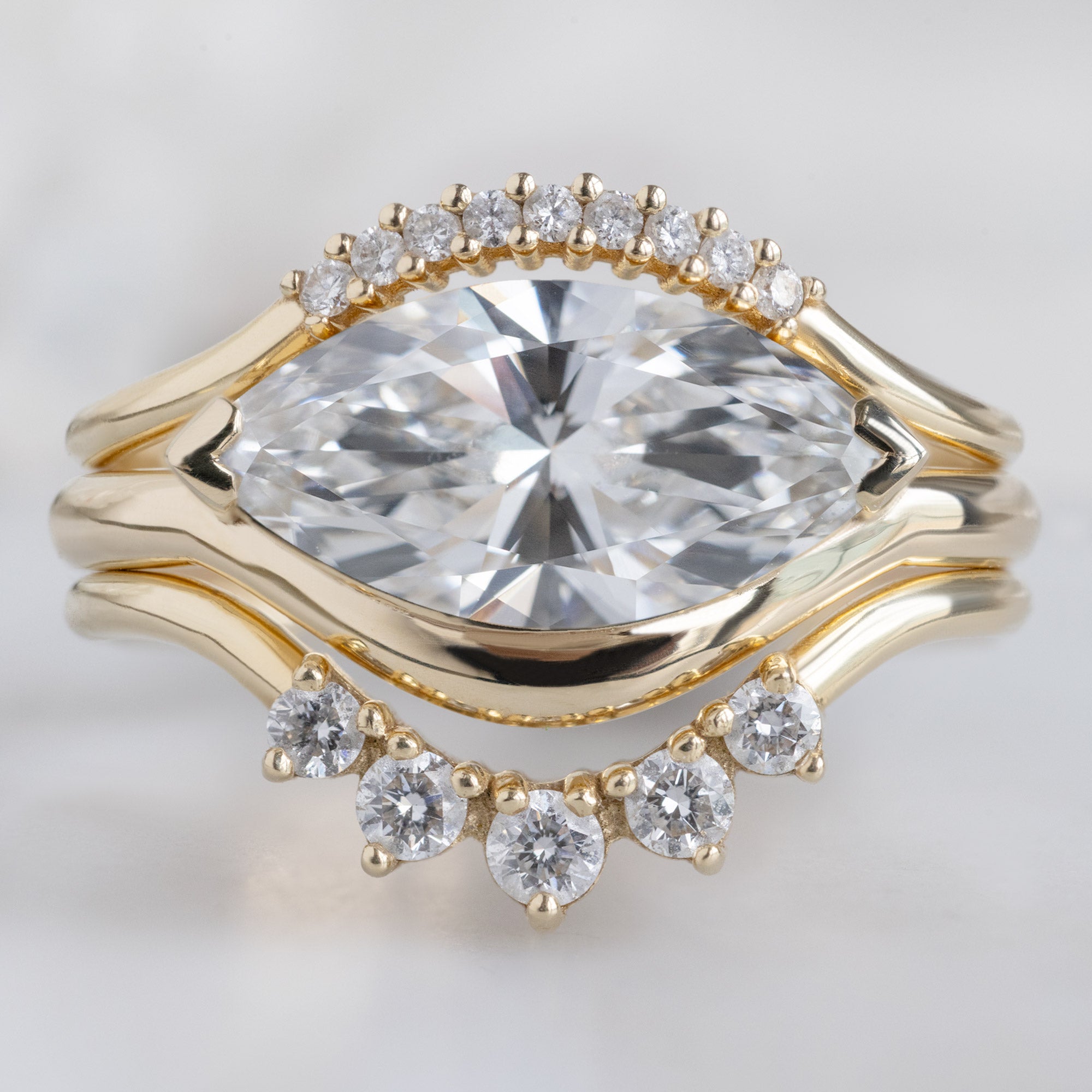 buy:white-diamond-pave-arc-stacking-band-14k-or-18k-yellow-gold,the-wave-ring-1-50ct-marquise-lab-grown-white-diamond-in-14k-yellow-gold,round-white-diamond-sunburst-stacking-band-14k-or-18k-yellow-gold