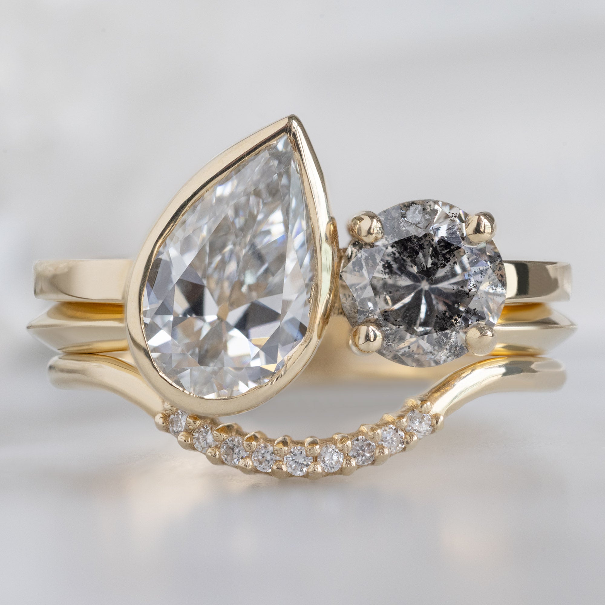 buy:the-you-and-me-ring-1-25ct-pear-lab-grown-white-diamond-in-14k-yellow-gold,gold-open-cuff-knife-edge-stacking-band-14k-yellow-gold,white-diamond-pave-arc-stacking-band-14k-or-18k-yellow-gold