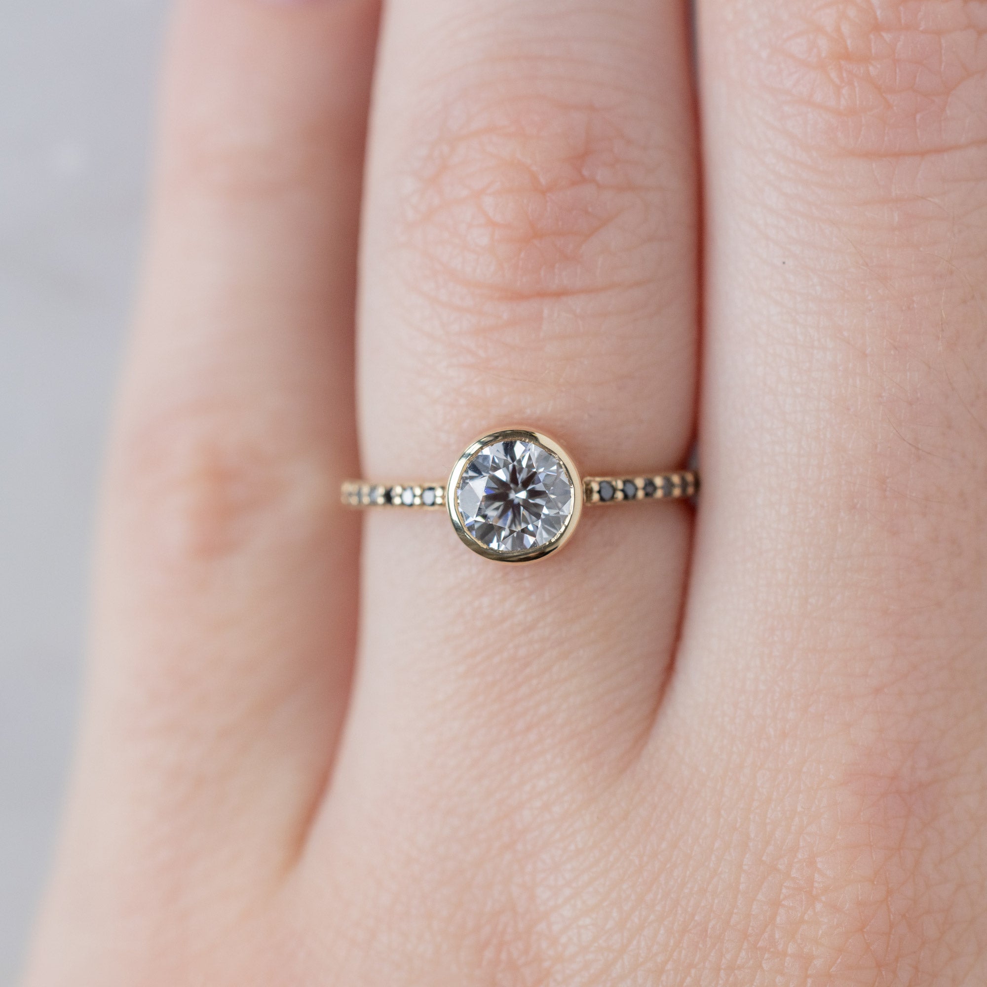 The Willow Ring with a 1.00ct Round Lab Grown White Diamond in 14K Yellow Gold on Model
