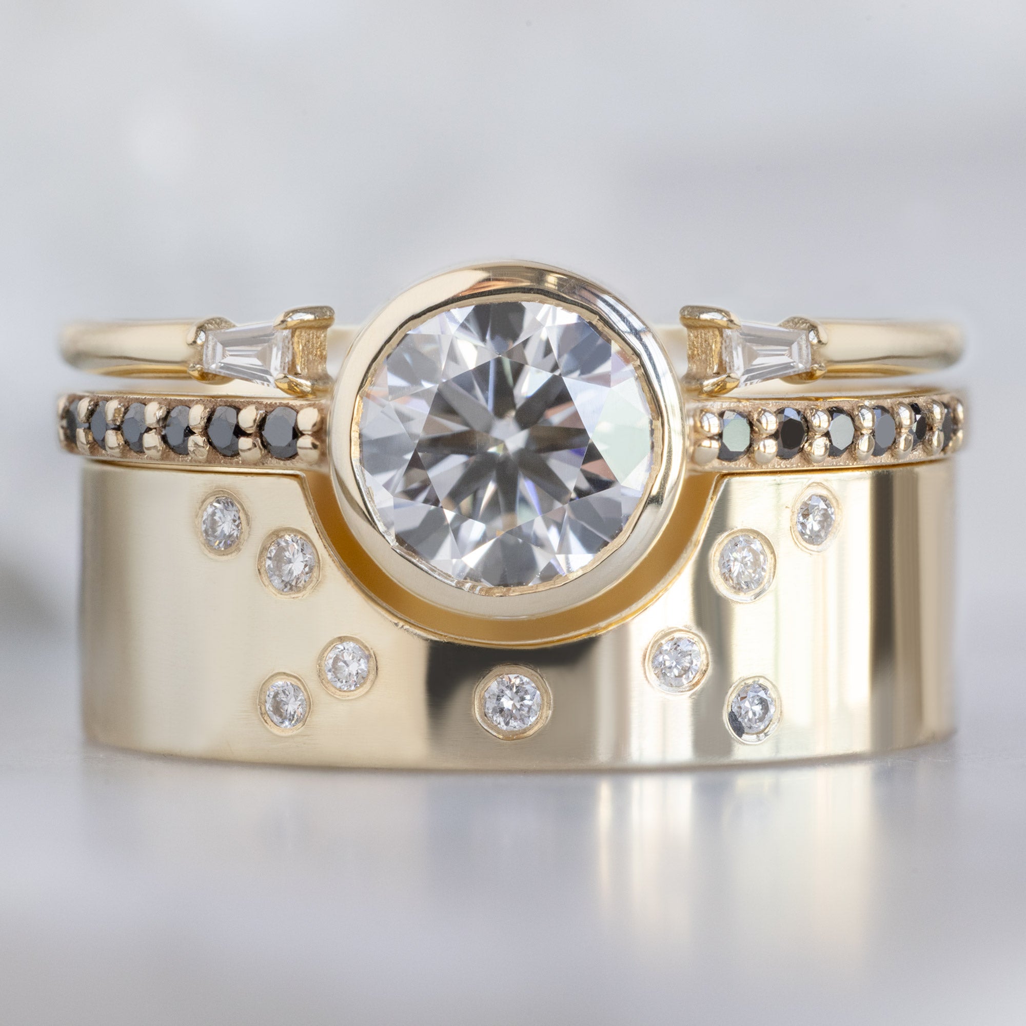 buy:open-cuff-baguette-white-diamond-stacking-band-14k-or-18k-yellow-gold,the-willow-ring-1-00ct-round-lab-grown-white-diamond-in-14k-yellow-gold,constellation-cut-out-stacking-band-arc-cut-out-in-14k-yellow-gold