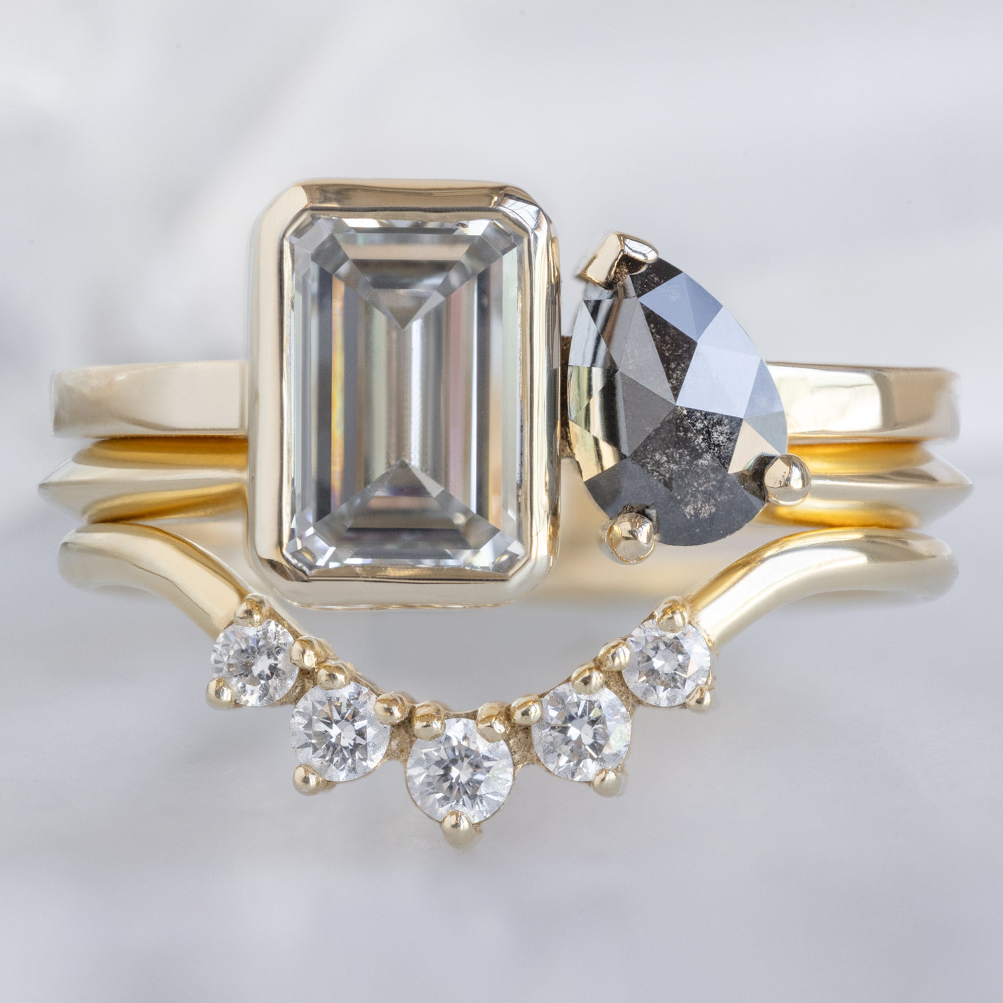 buy:the-you-and-me-ring-1-25ct-emerald-cut-lab-grown-white-diamond-in-14k-yellow-gold,gold-open-cuff-knife-edge-stacking-band-14k-yellow-gold,round-white-diamond-sunburst-stacking-band-14k-or-18k-yellow-gold