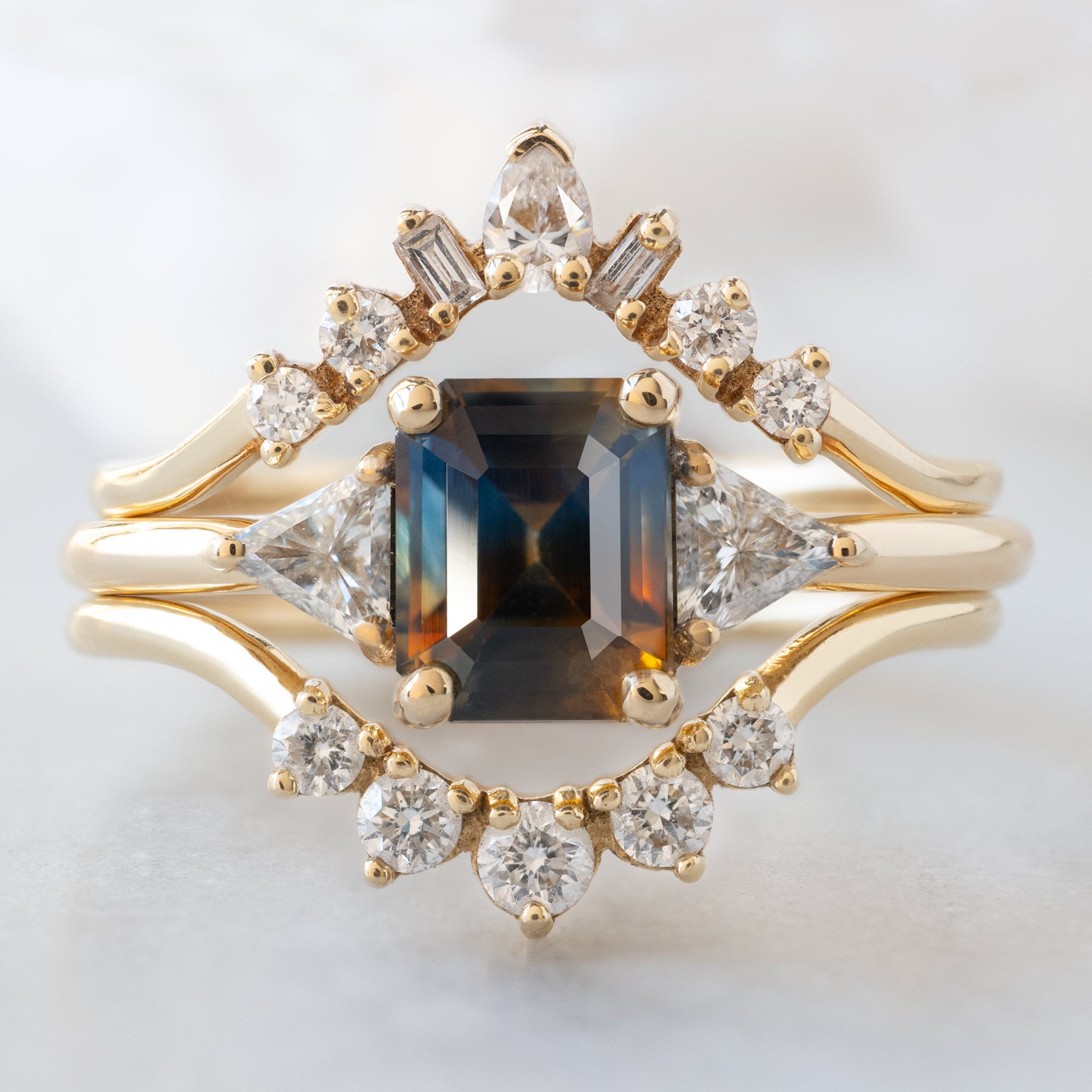 buy:geometric-white-diamond-sunburst-stacking-band-14k-or-18k-yellow-gold,the-jade-ring-1-19ct-emerald-cut-parti-sapphire-in-14k-yellow-gold,round-white-diamond-sunburst-stacking-band-14k-or-18k-yellow-gold