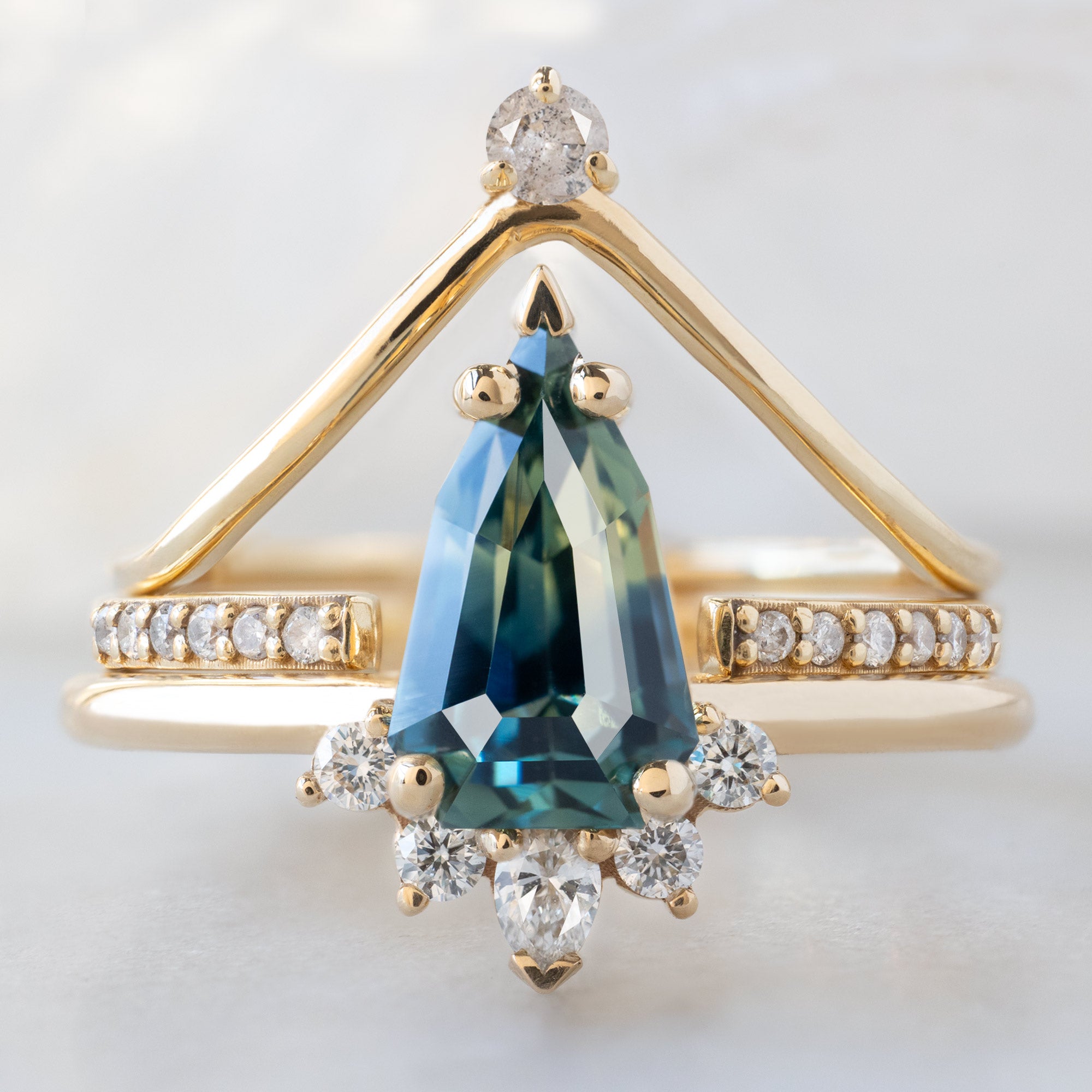 buy:white-diamond-crown-stacking-band-14k-or-18k-yellow-gold,open-cuff-white-diamond-pave-stacking-band-14k-or-18k-yellow-gold,the-aster-ring-1-56ct-geometric-montana-parti-sapphire-in-14k-yellow-gold