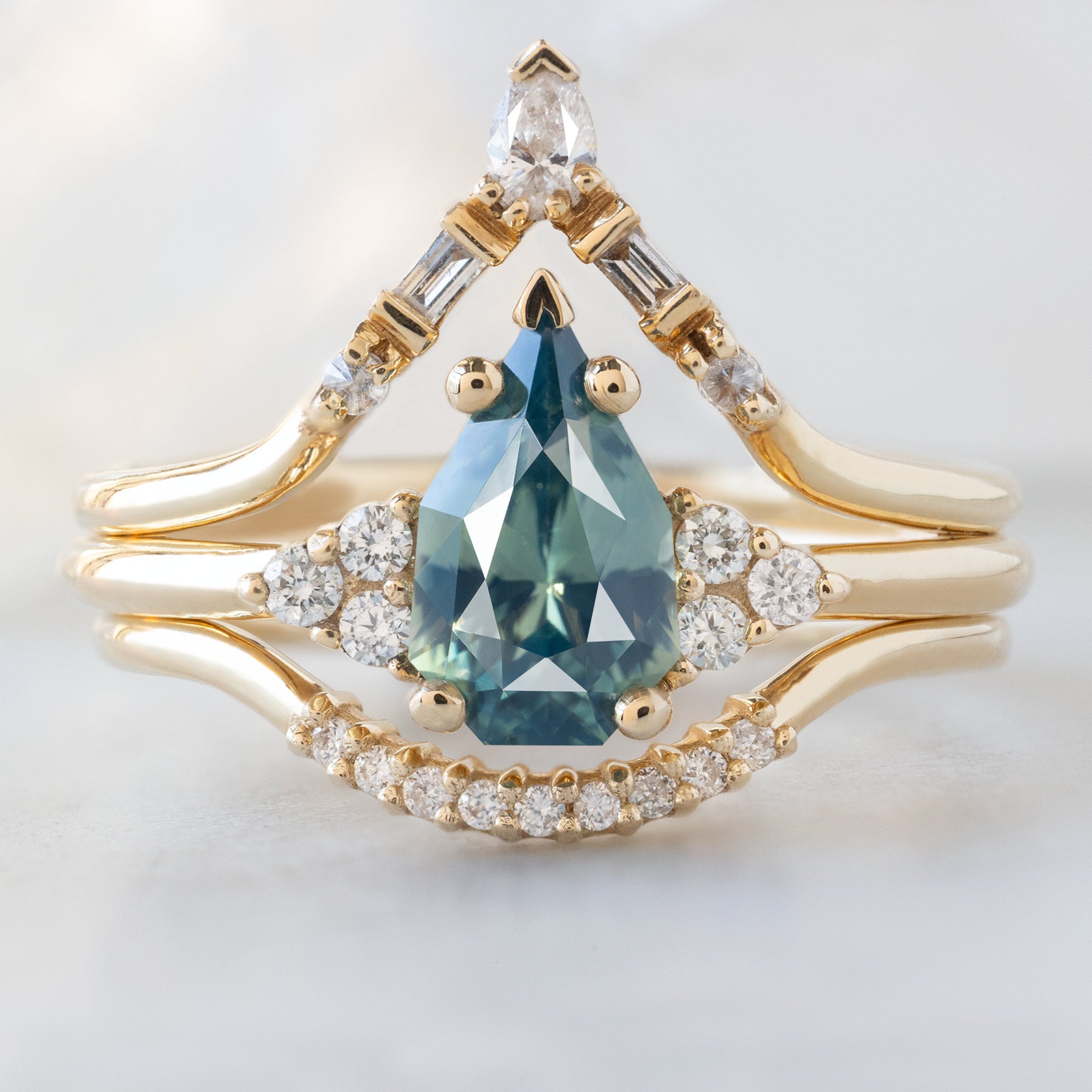 buy:white-diamond-tiara-stacking-band-14k-or-18k-yellow-gold,the-ivy-ring-1-07ct-geometric-montana-bicolor-sapphire,white-diamond-pave-arc-stacking-band-14k-or-18k-yellow-gold