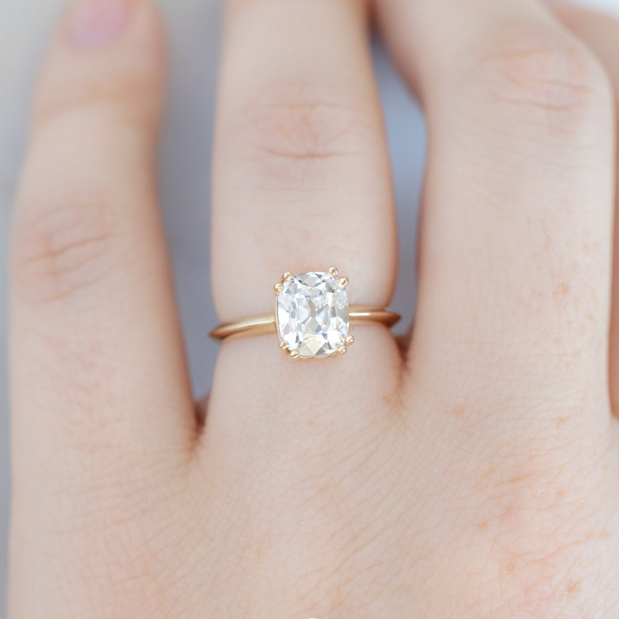 The Bryn Ring with a 2.04ct Old Mine Cut Lab Grown White Diamond in 14K Yellow Gold on Model