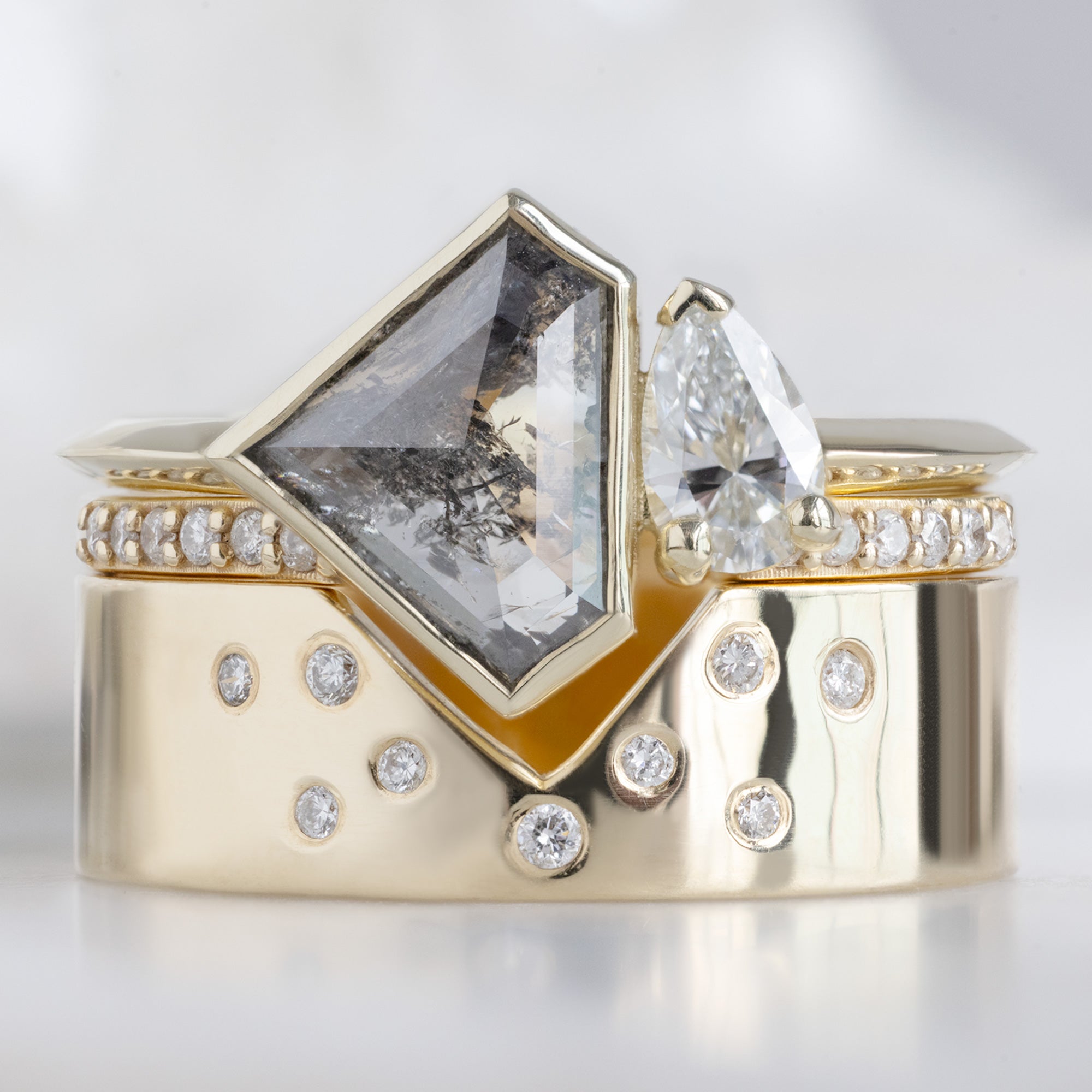 buy:the-you-and-me-ring-1-35ct-shield-salt-and-pepper-in-14k-yellow-gold,open-cuff-white-diamond-pave-stacking-band-14k-or-18k-yellow-gold,constellation-cut-out-stacking-band-peak-cut-out-in-14k-white-gold