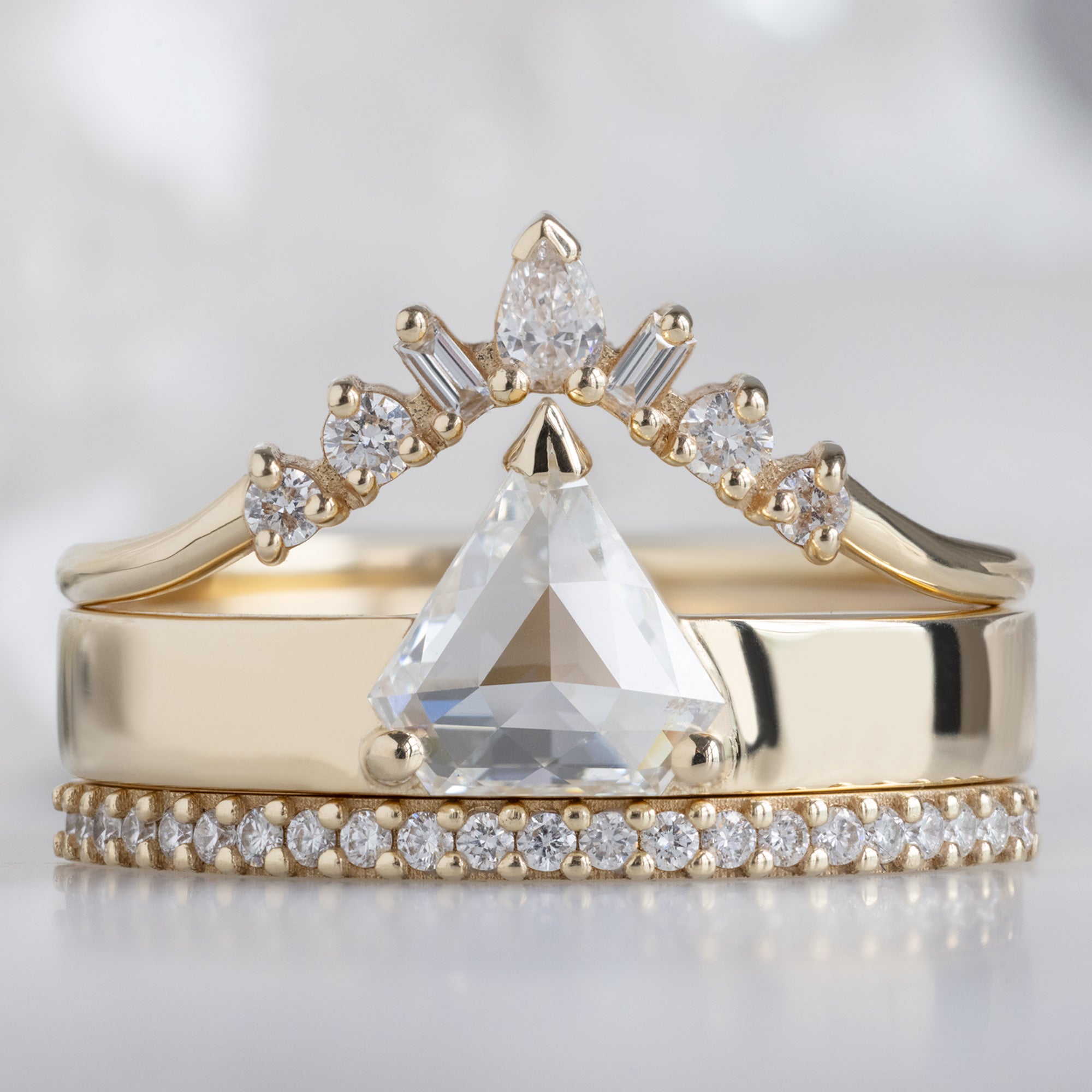 buy:geometric-white-diamond-sunburst-stacking-band-14k-or-18k-yellow-gold,the-cigar-ring-66ct-natural-shield-white-diamond-in-14k-yellow-gold,the-white-diamond-pave-wedding-band-14k-or-18k-yellow-gold