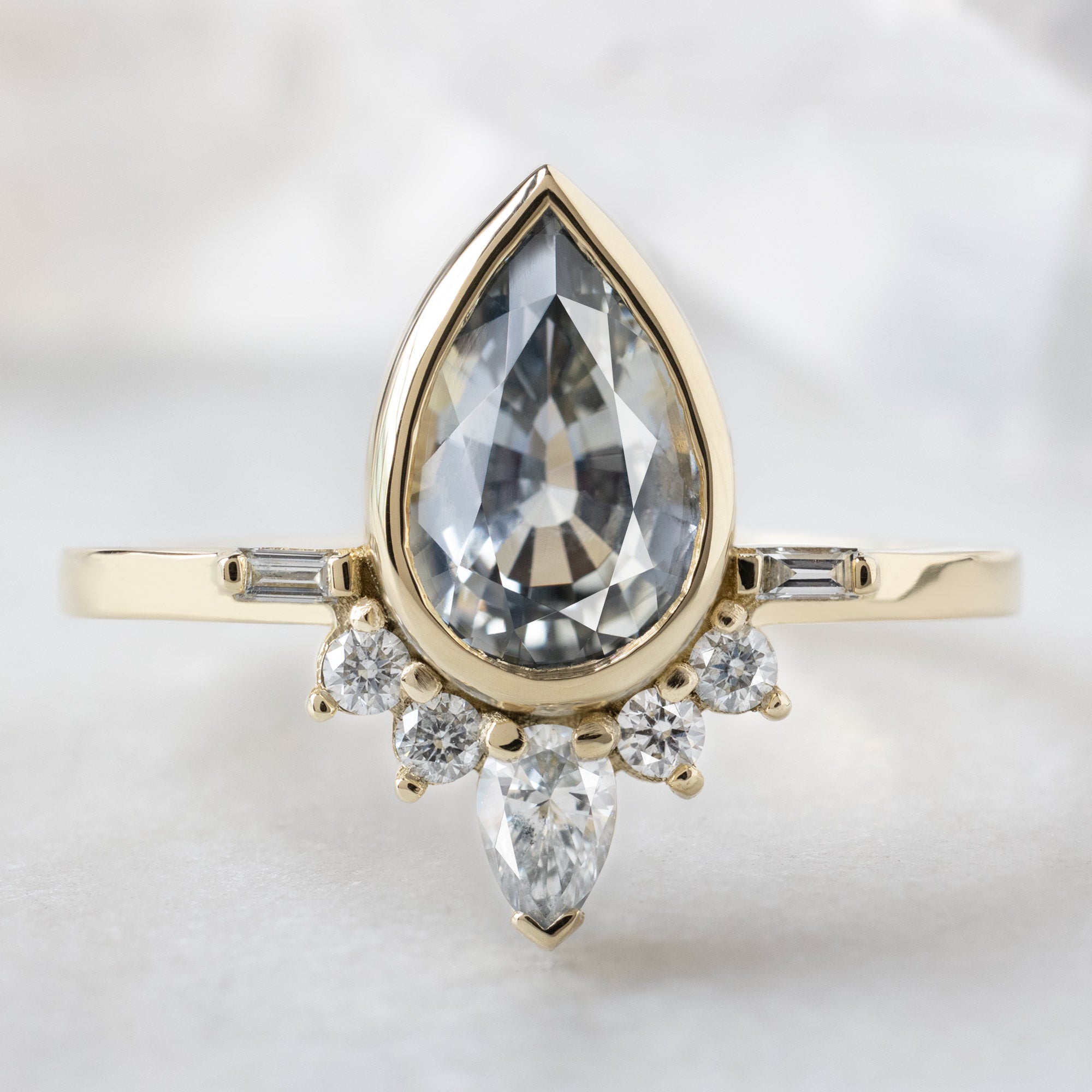Alexis Russell  Engagement Rings The Watercolor Posy Ring | 1.96ct Pear Icy Blue Sapphire in 14K Yellow Gold