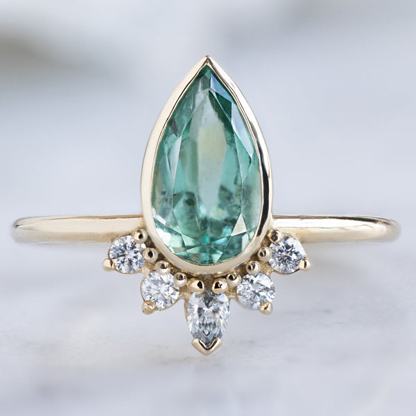 Alexis Russell  Engagement Rings The Aster Ring | with a 1.38ct Pear Emerald in 14K Yellow Gold