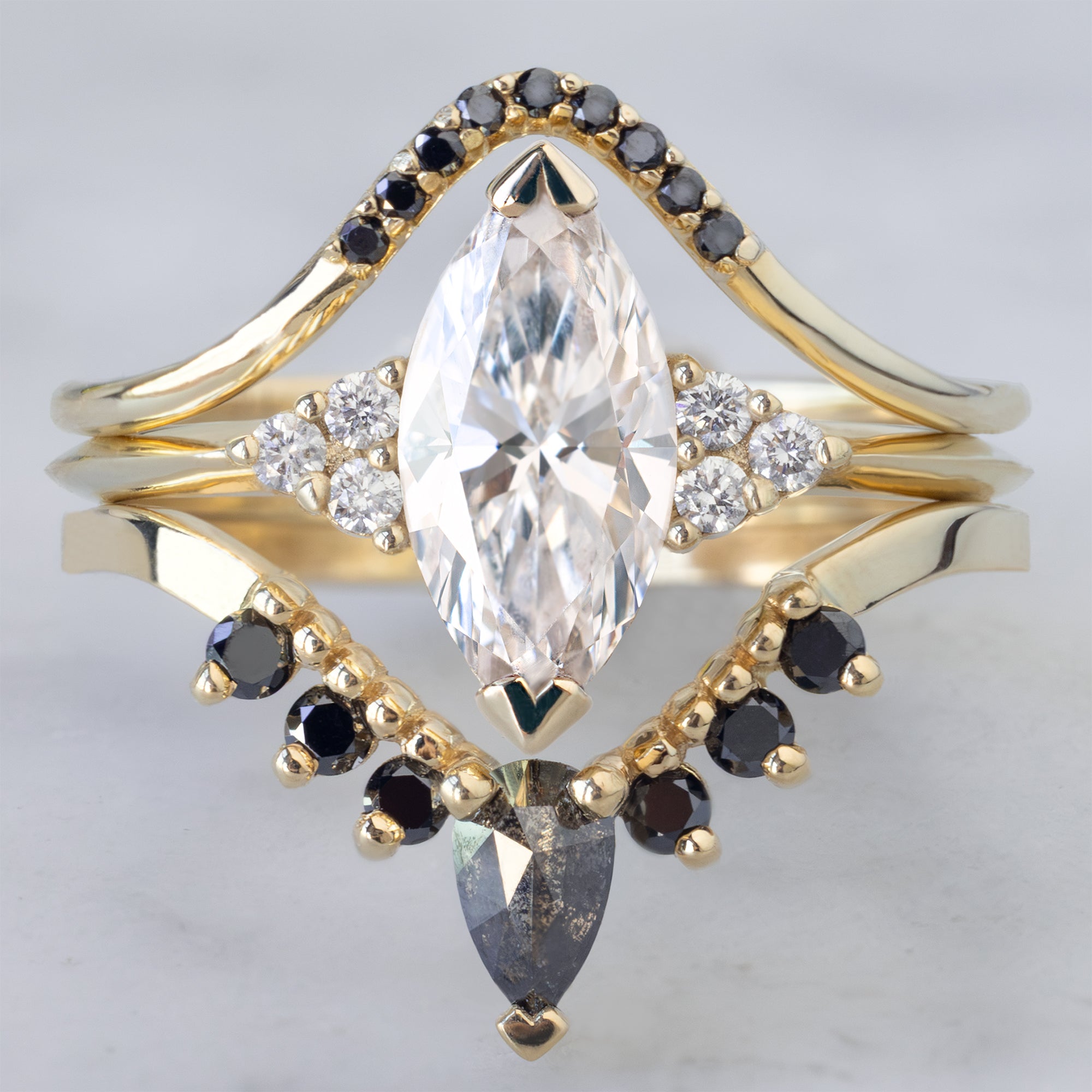 buy:black-diamond-pave-peak-stacking-band-14k-or-18k-rose-gold,the-ivy-ring-with-a-1-00ct-lab-grown-marquise-white-diamond-in-14k-yellow-gold,pear-black-diamond-sunburst-stacking-band-14k-gold