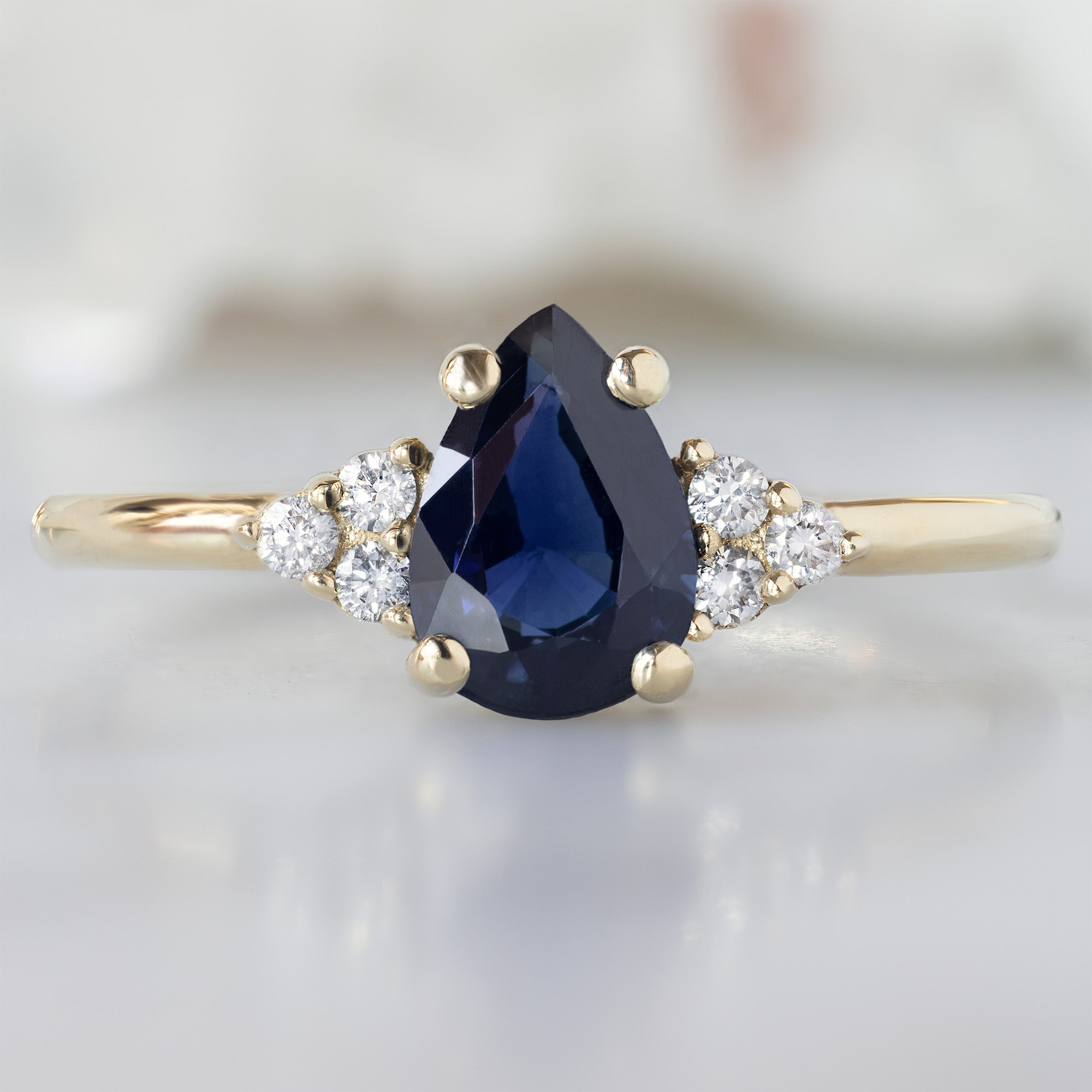 Alexis Russell  Engagement Rings The Ivy Ring | with a 0.90ct Pear Blue Sapphire in 14K Yellow Gold
