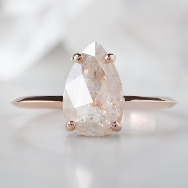The Bryn Ring with a 1.35ct Pear Pink Diamond in 14K Rose Gold on White Marble