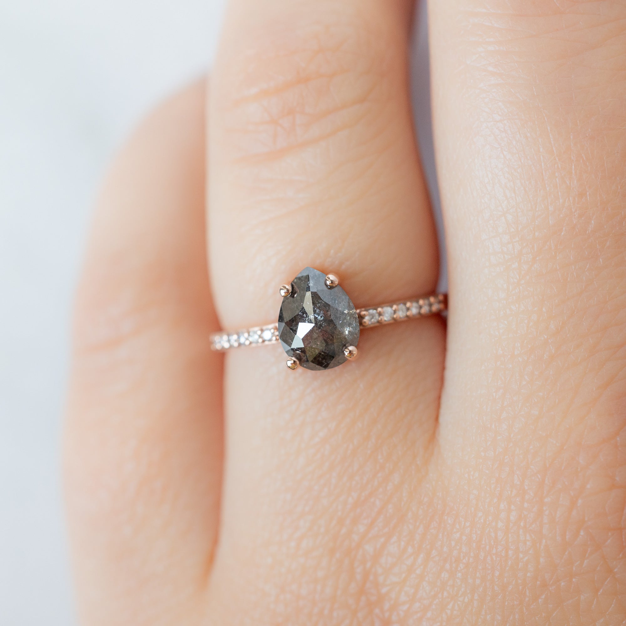 The Willow Ring with a 1.38ct Pear Black Diamond in 14K Rose Gold on Model