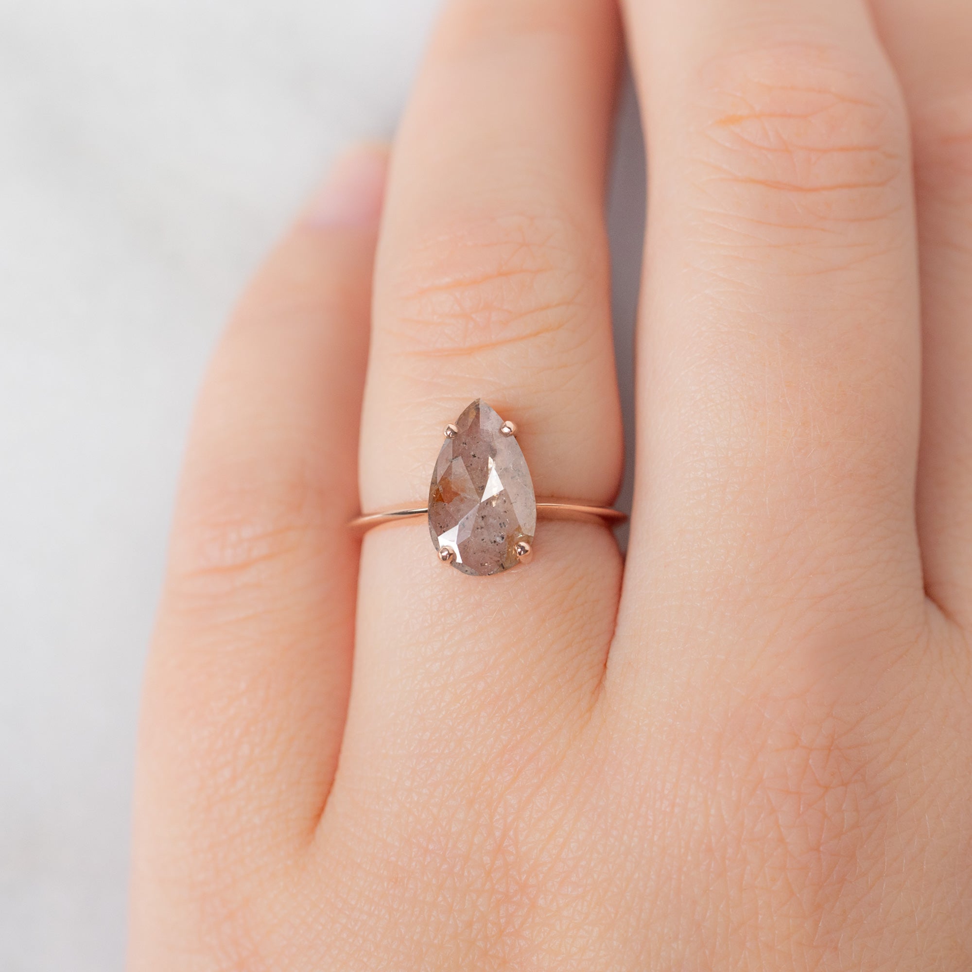 The Bryn Ring with a 1.76ct Pear Pink Diamond in 14K Rose Gold on Model