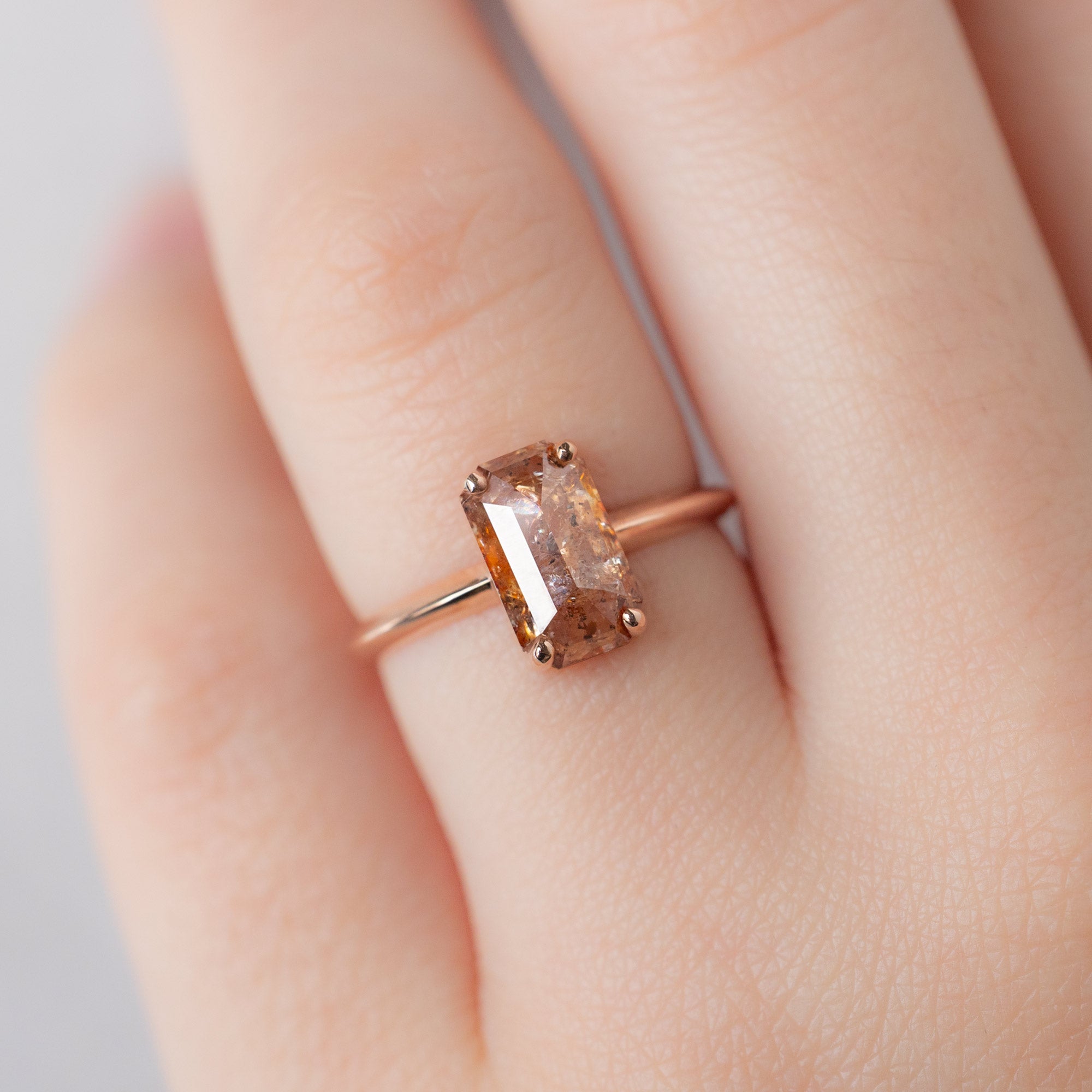 The Bryn Ring with a 2.01ct Emerald Cut Red Diamond in 14K Rose Gold on Model