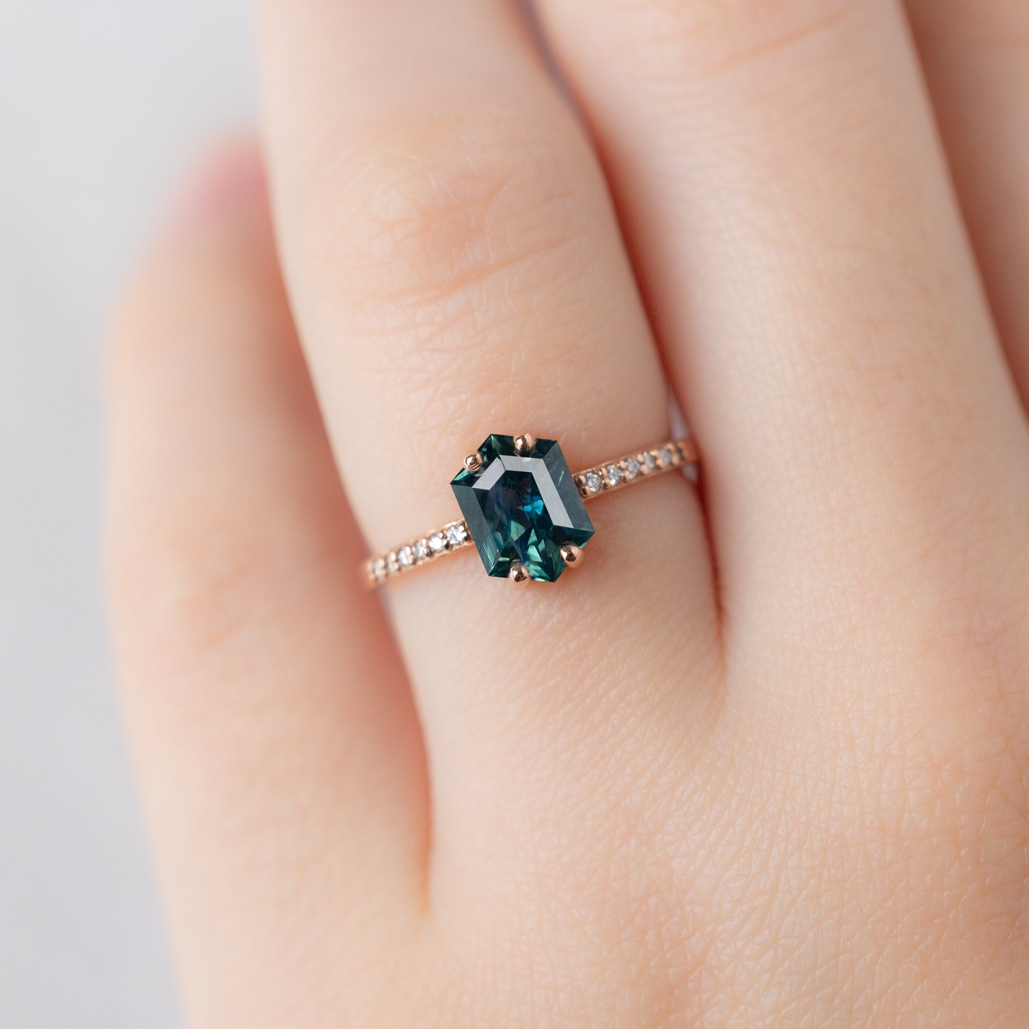 The Willow Ring with a 1.28ct Hexagon Blue Sapphire in 14K Rose Gold on Model