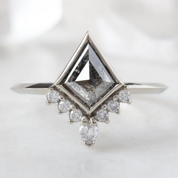 The Aster Ring with a 0.92ct Kite Black Diamond in 14K White Gold on White Marble