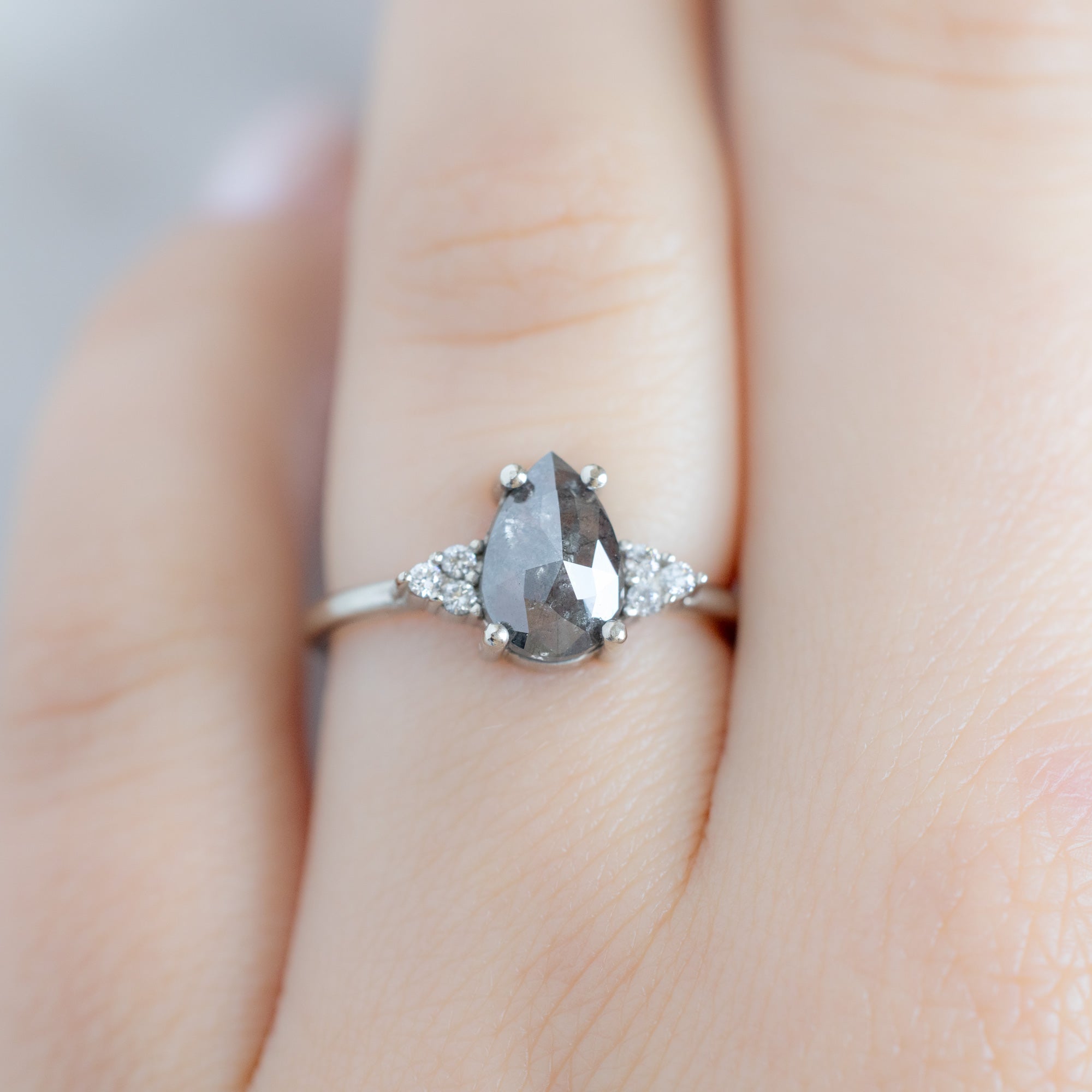 The Ivy Ring with a 1.46ct Pear Salt and Pepper Diamond in 14K White Gold on Model