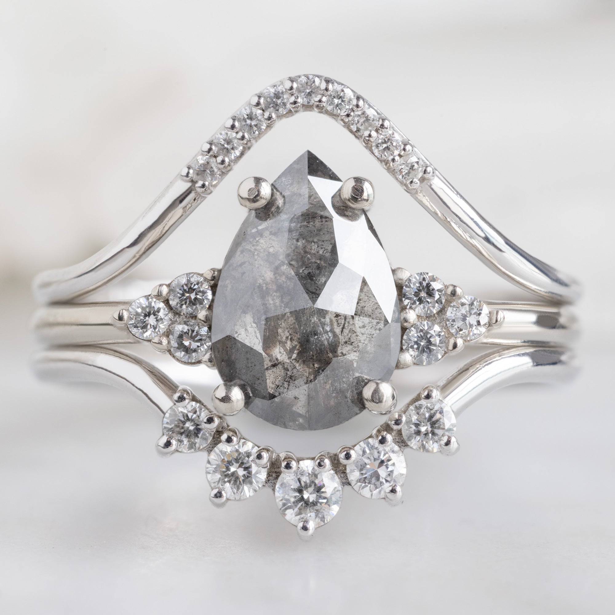 buy:white-diamond-pave-peak-stacking-band-14k-or-18k-yellow-gold,the-ivy-ring-1-46ct-pear-salt-and-pepper-diamond-in-14k-white-gold,round-white-diamond-sunburst-stacking-band-14k-or-18k-yellow-gold