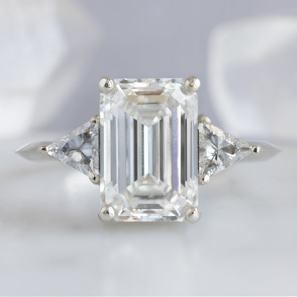 The Jade Ring with a 2.58ct Emerald Cut Lab Grown White Diamond in 14K White Gold on Light Grey Background
