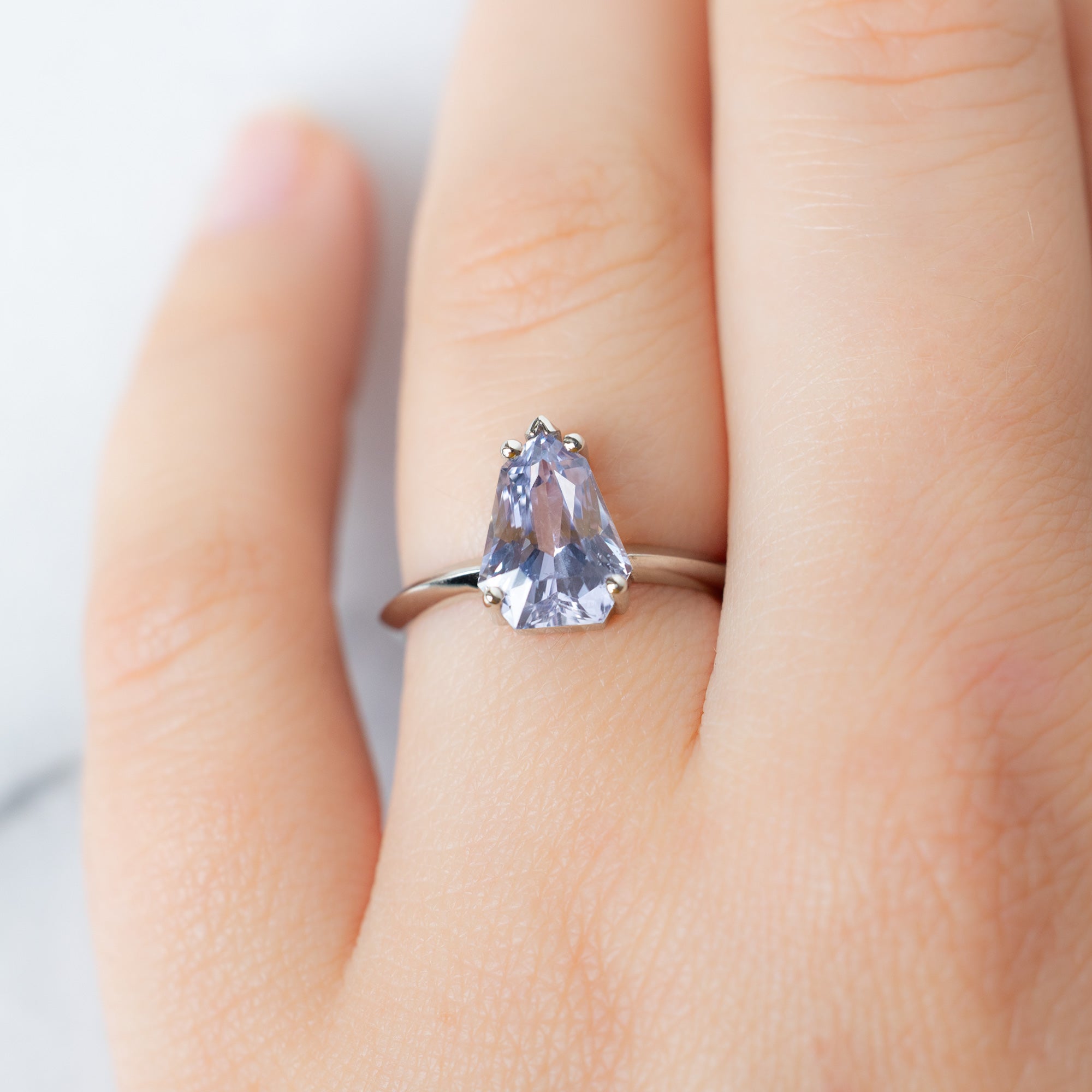 The Sage Ring with a 2.33ct Geometric Periwinkle Sapphire in 14K White Gold on Model