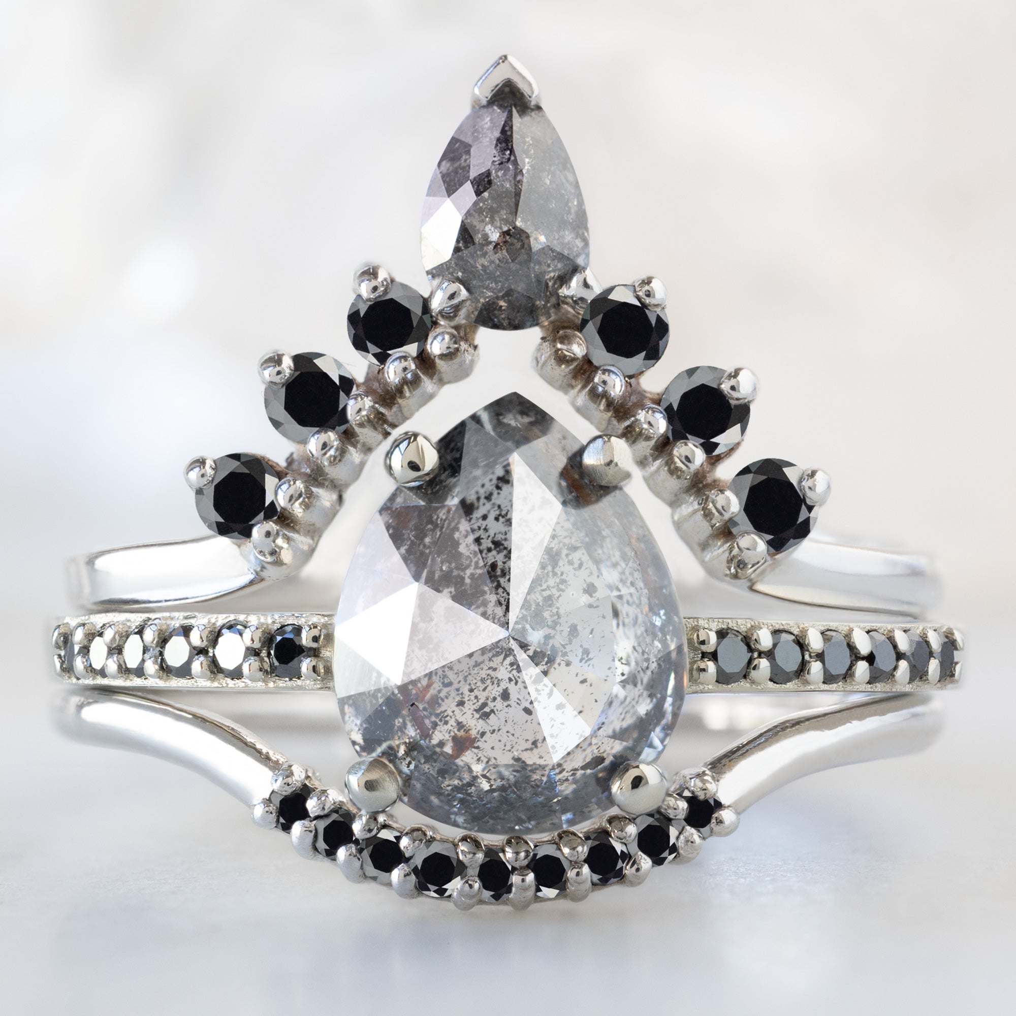 buy:pear-black-diamond-sunburst-stacking-band-14k-gold,the-willow-ring-1-56ct-pear-salt-and-pepper-diamond-in-14k-white-gold,black-diamond-pave-arc-stacking-band-14k-or-18k-rose-gold