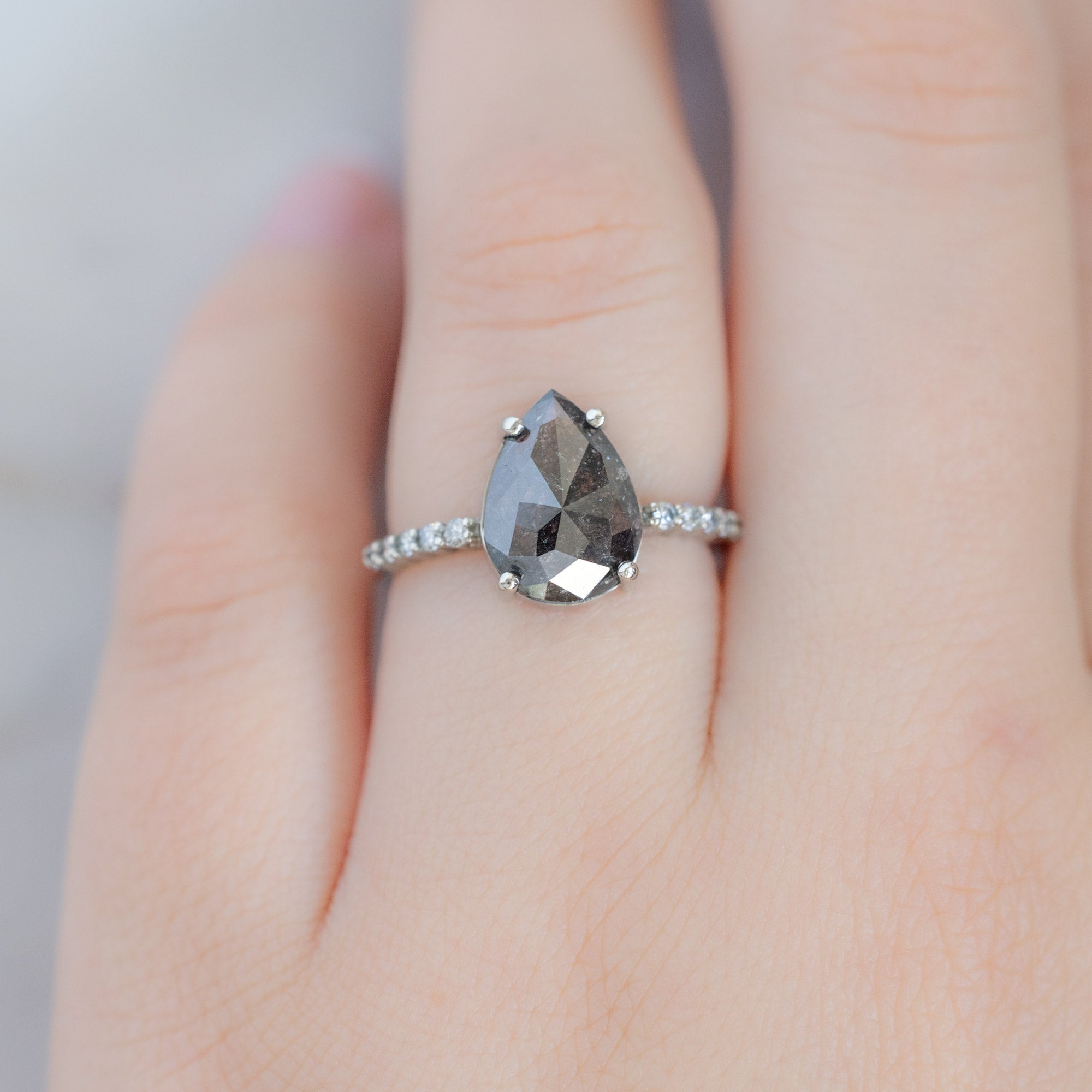 The Luxe Willow Ring with a 2.03ct Pear Black Diamond in 14K White Gold on Model