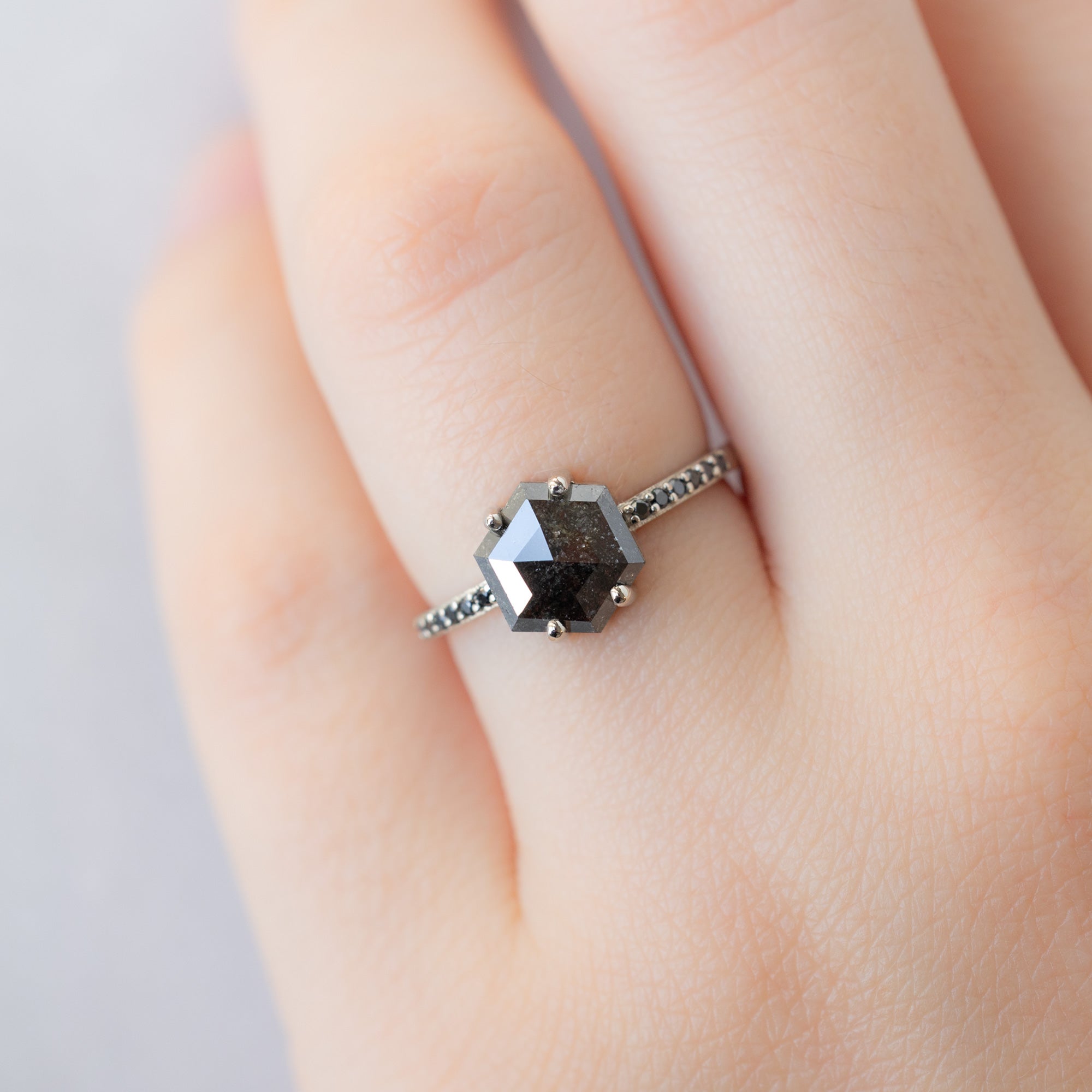 The Willow Ring with a 1.34ct Hexagon Black Diamond in 14K White Gold on Model