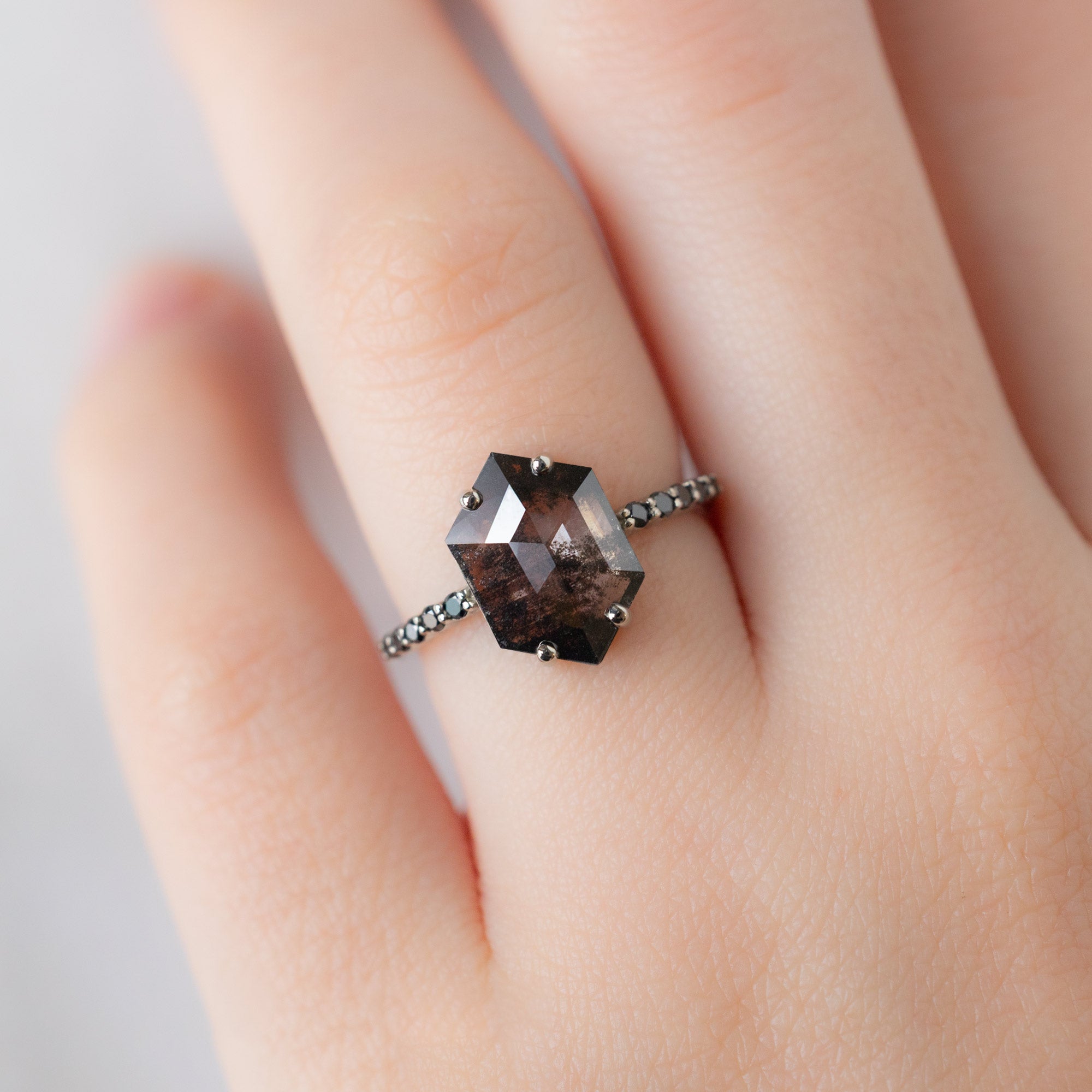 The Luxe Willow Ring with a 1.53ct Hexagon Lab Grown Salt and Pepper Diamond in 14K White Gold on Model