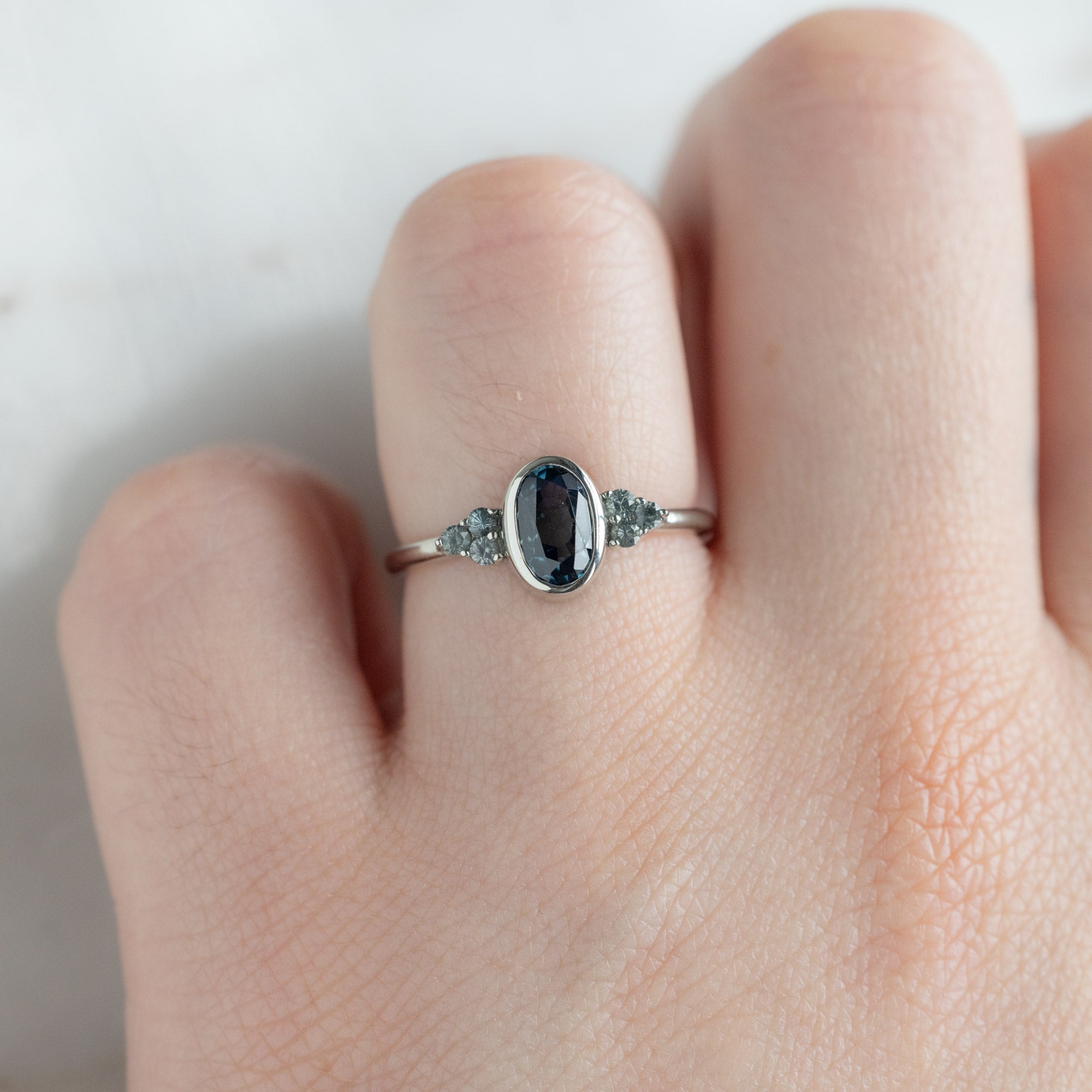 Alexis Russell  Engagement Rings The Ivy Ring | with a 1.58ct Oval Blue Sapphire in 14K White Gold