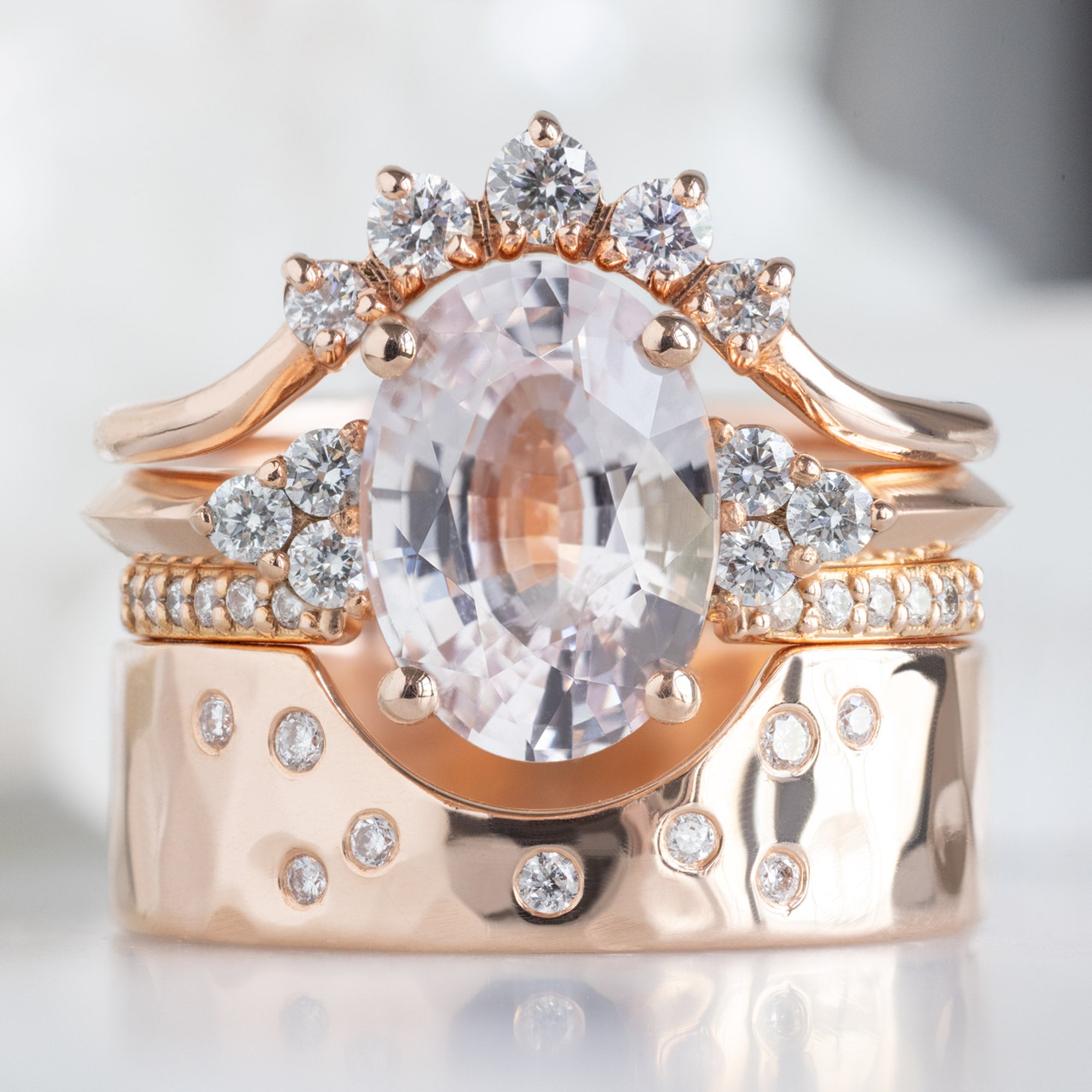 buy:round-white-diamond-sunburst-stacking-band-14k-or-18k-yellow-gold,the-ivy-ring-2-12ct-oval-cut-peach-sapphire-in-18k-rose-gold,open-cuff-white-diamond-pave-stacking-band-14k-or-18k-yellow-gold,constellation-cut-out-stacking-band-arc-cut-out-in-14k-yellow-gold