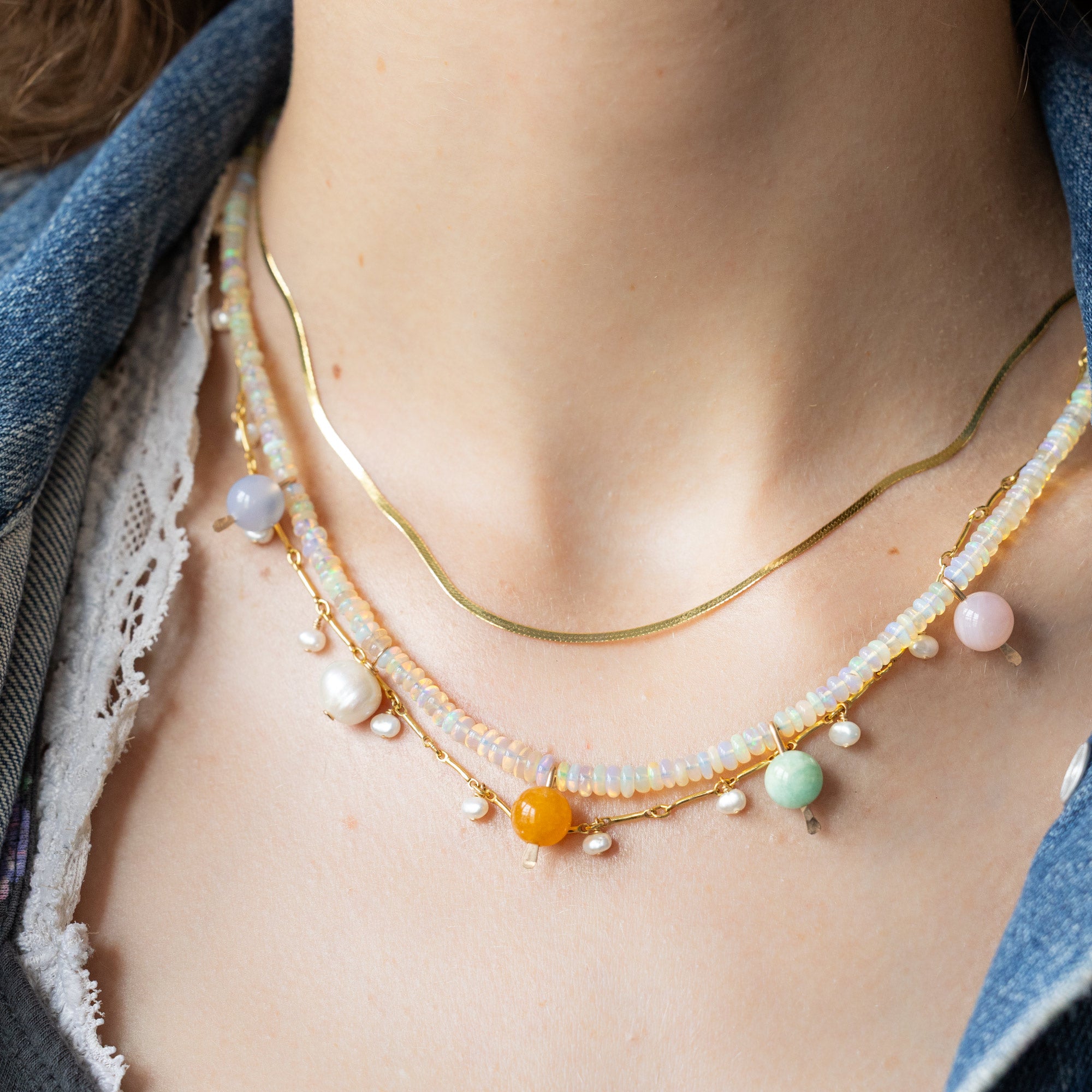 buy:the-herringbone-chain-necklace-14k-yellow-gold,opal-gumball-beaded-necklace-yellow-gold,the-pearl-party-station-necklace-gold-filled