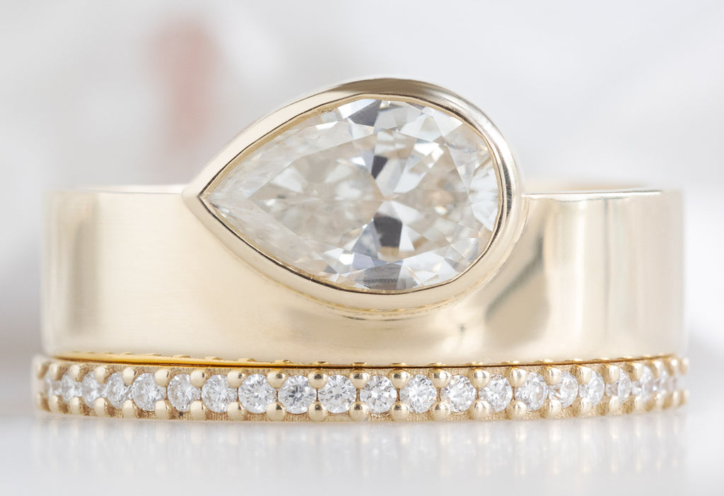 One Of A Kind Cigar Band with a Pear-Cut White Diamond with White Pavé Diamond Stacking Band