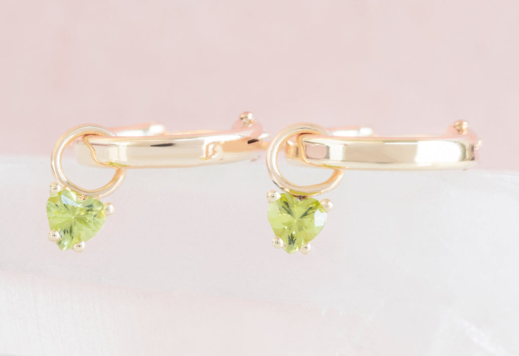 Side View of Yellow Gold Peridot Heart Hoops