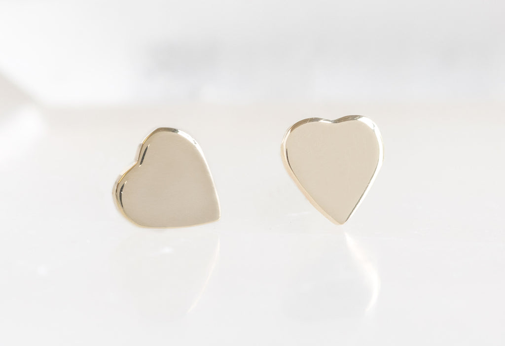 10k Yellow Gold Sweetheart Stud Earrings on  on White Marble Tile