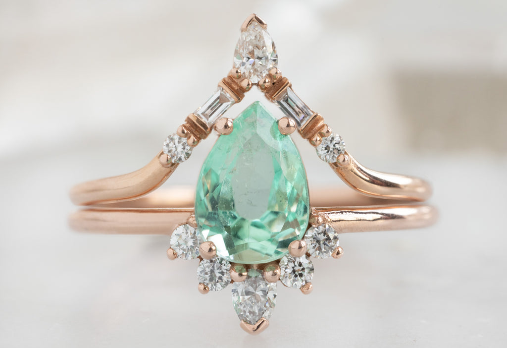 The Aster Ring with a Pear-Cut Emerald with White Diamond Tiara Stacking Band