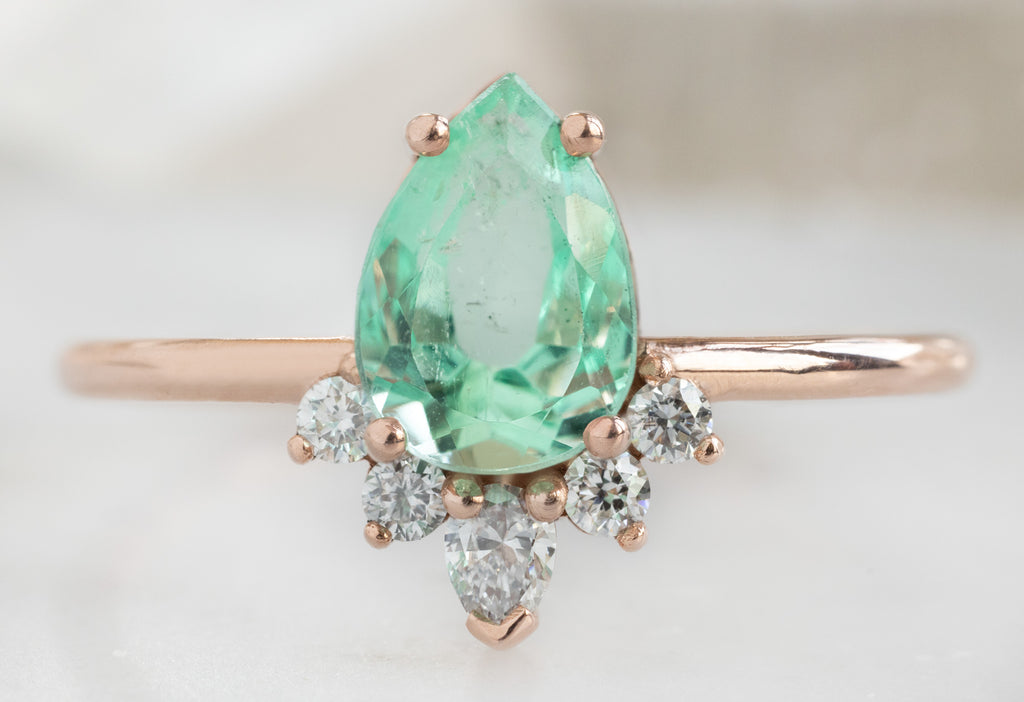 The Aster Ring with a Pear-Cut Emerald