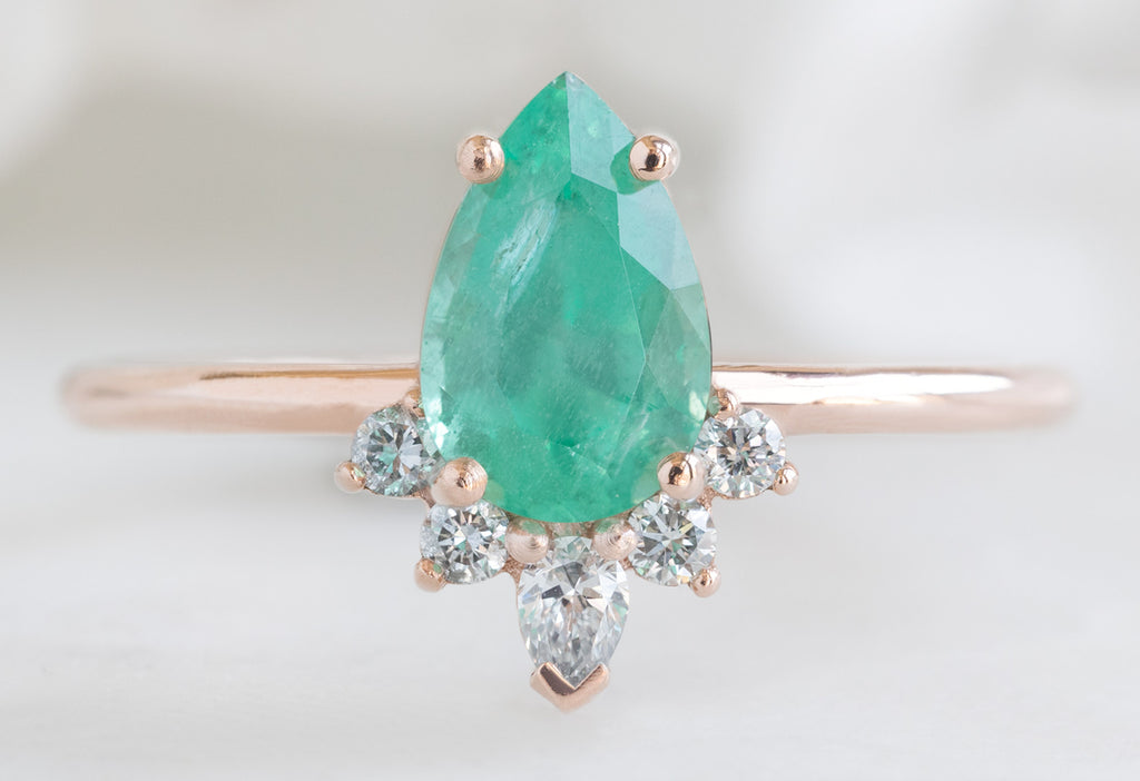 The Aster Ring with a Pear-Cut Emerald