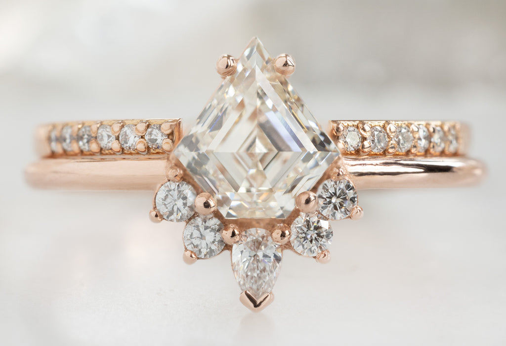 The Aster Ring with a Shield-Cut White Diamond with Open Cuff Pavé Stacking Band