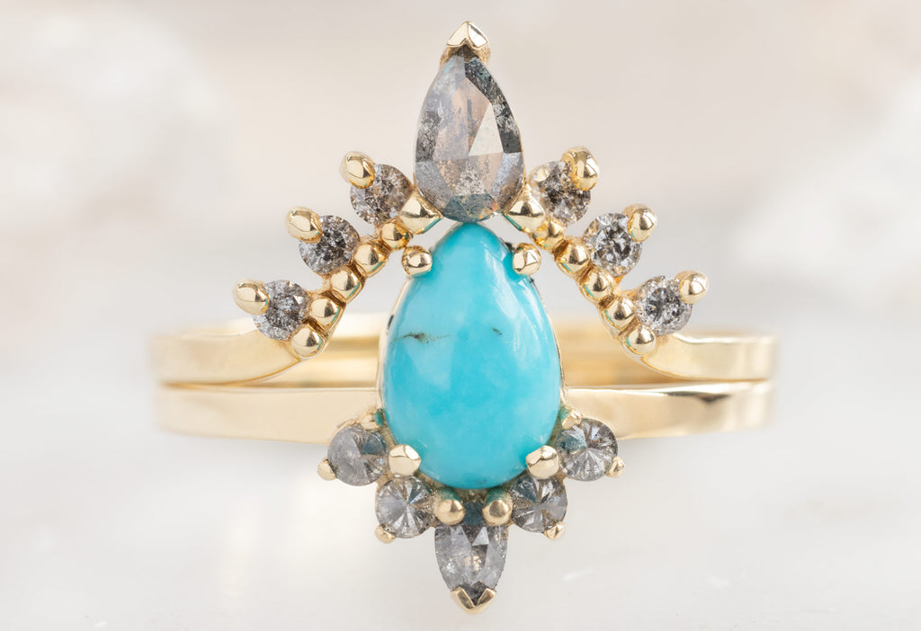 The Aster Ring with a Sleeping Beauty Pear Shaped Turquoise with Salt and Pepper Diamond Sunburst Stacking Band