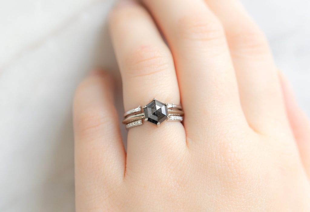 The Bryn Ring with a Black Hexagon Diamond with Stacking Bands on Model
