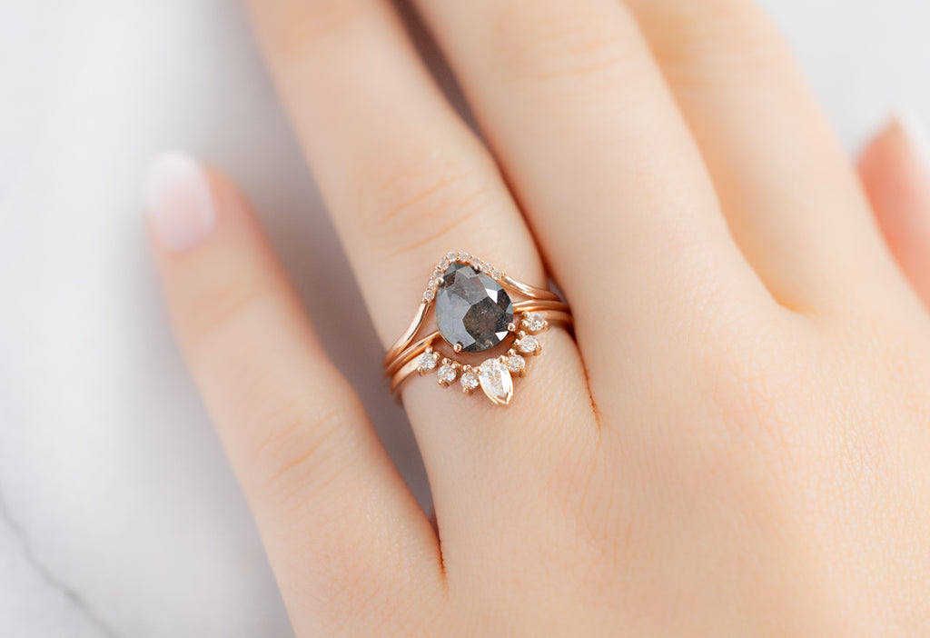 The Bryn Ring with a Rose-Cut Black Diamond with Stacking Bands on Model