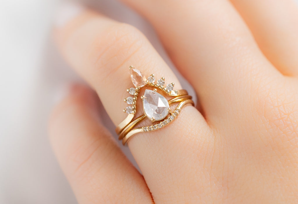 The Bryn Ring with a Rose-Cut Icy White Diamond with Sunstone and White Diamond Stacking Bands on Model