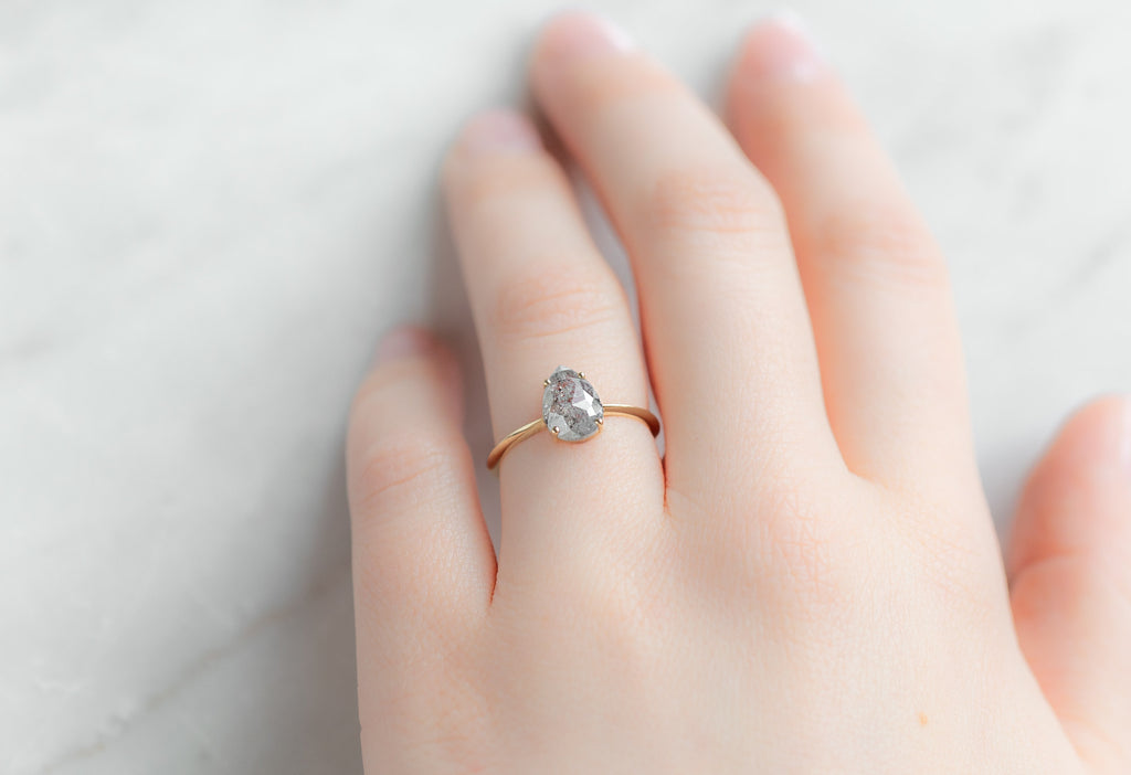 The Bryn Ring with a Rose-Cut Silvery Grey Diamond on Model