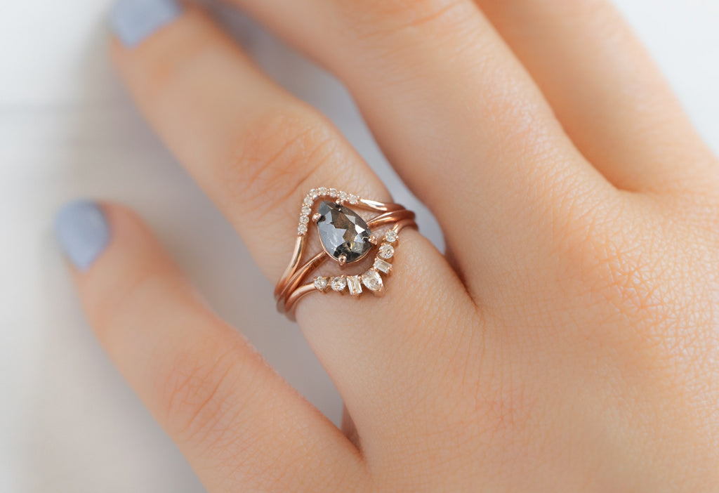 The Bryn Ring with a Rose-Cut Salt and Pepper Diamond with White Diamond Stacking Bands on Model