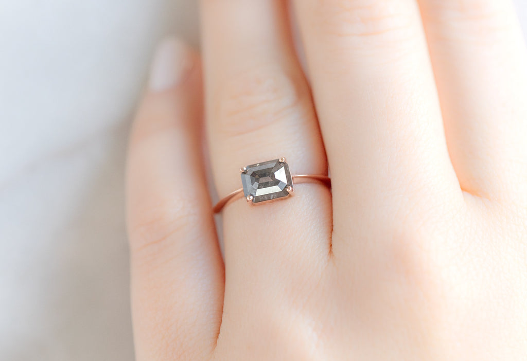 The Bryn Ring with an Emerald-Cut Black Diamond on Model