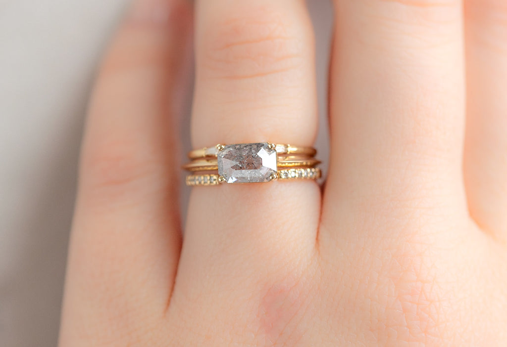 The Bryn Ring with an Emerald-Cut Salt and Pepper Diamond with White Diamond STacking Bands