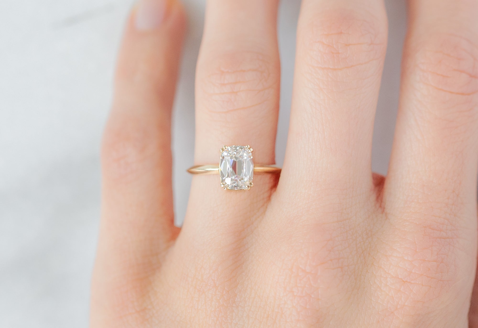 The Bryn Ring with an Old Mine Cut Lab Grown Diamond on Model