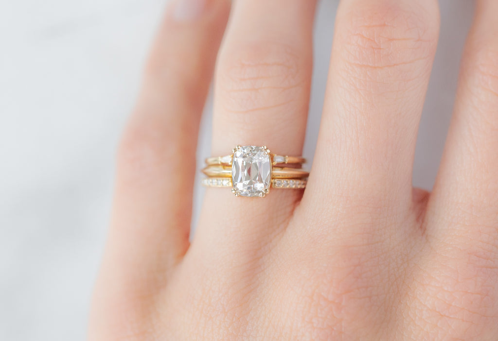 The Bryn Ring with an Old Mine Cut Lab Grown Diamond with White Diamond Stacking Bands on Model