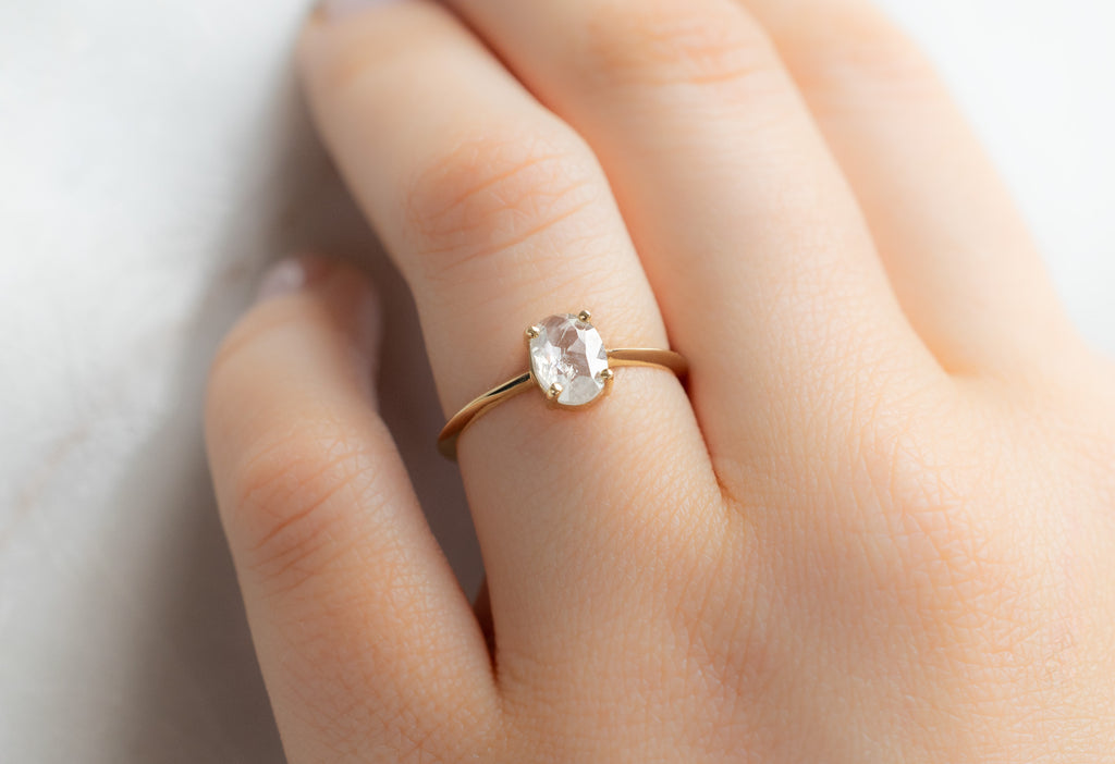 The Bryn Ring with an Oval-Cut Icy-White Diamond on Model